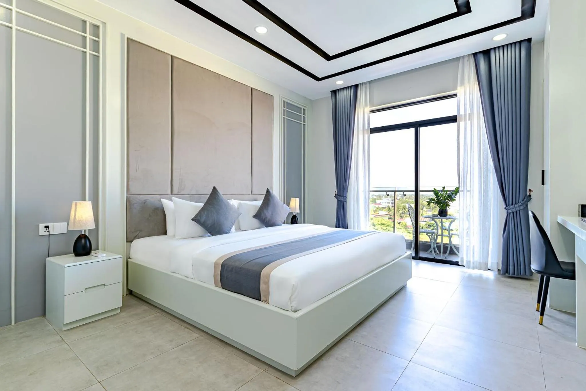 Bed in The Square Kampot Hotel