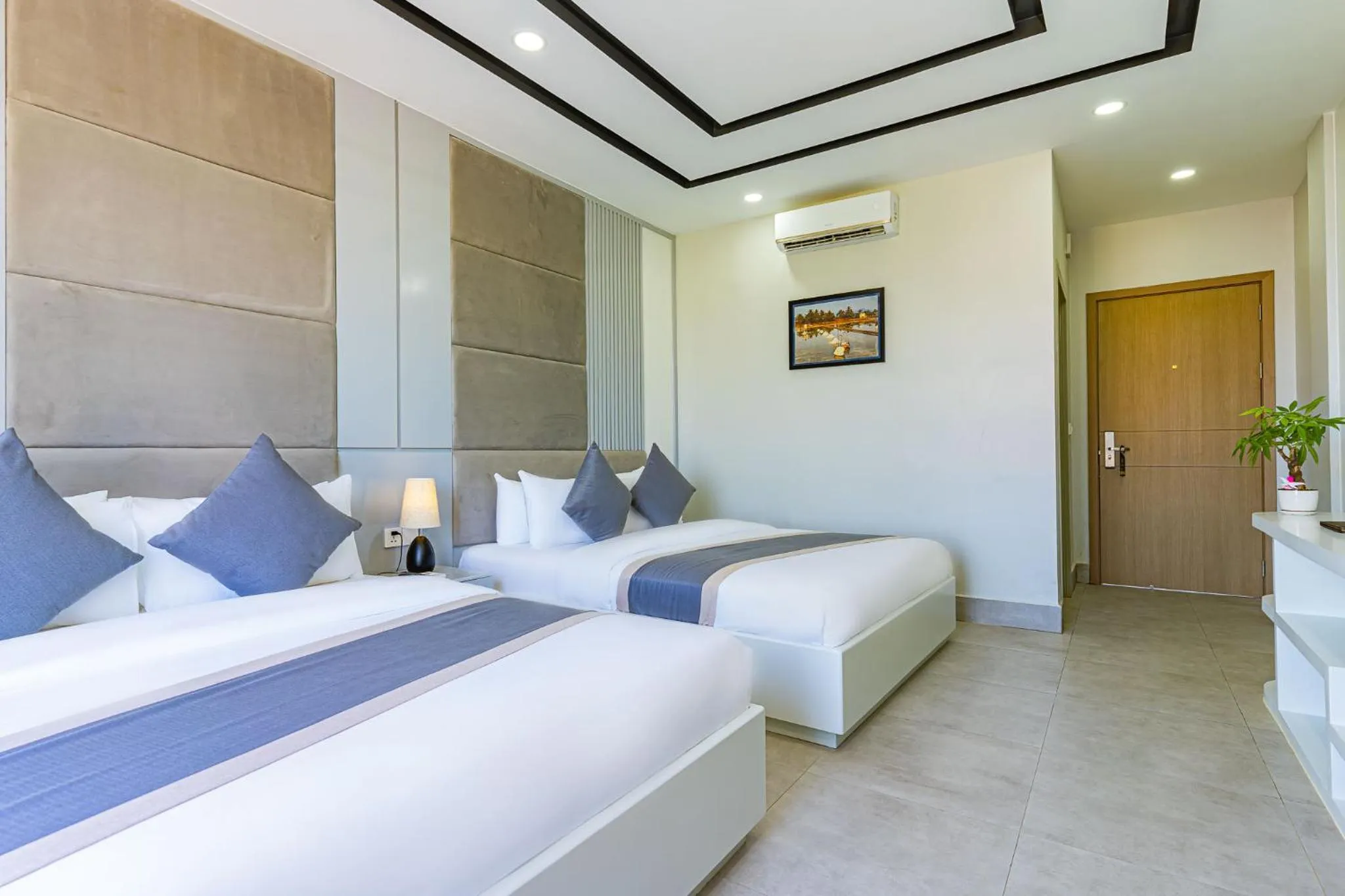 Bed in The Square Kampot Hotel