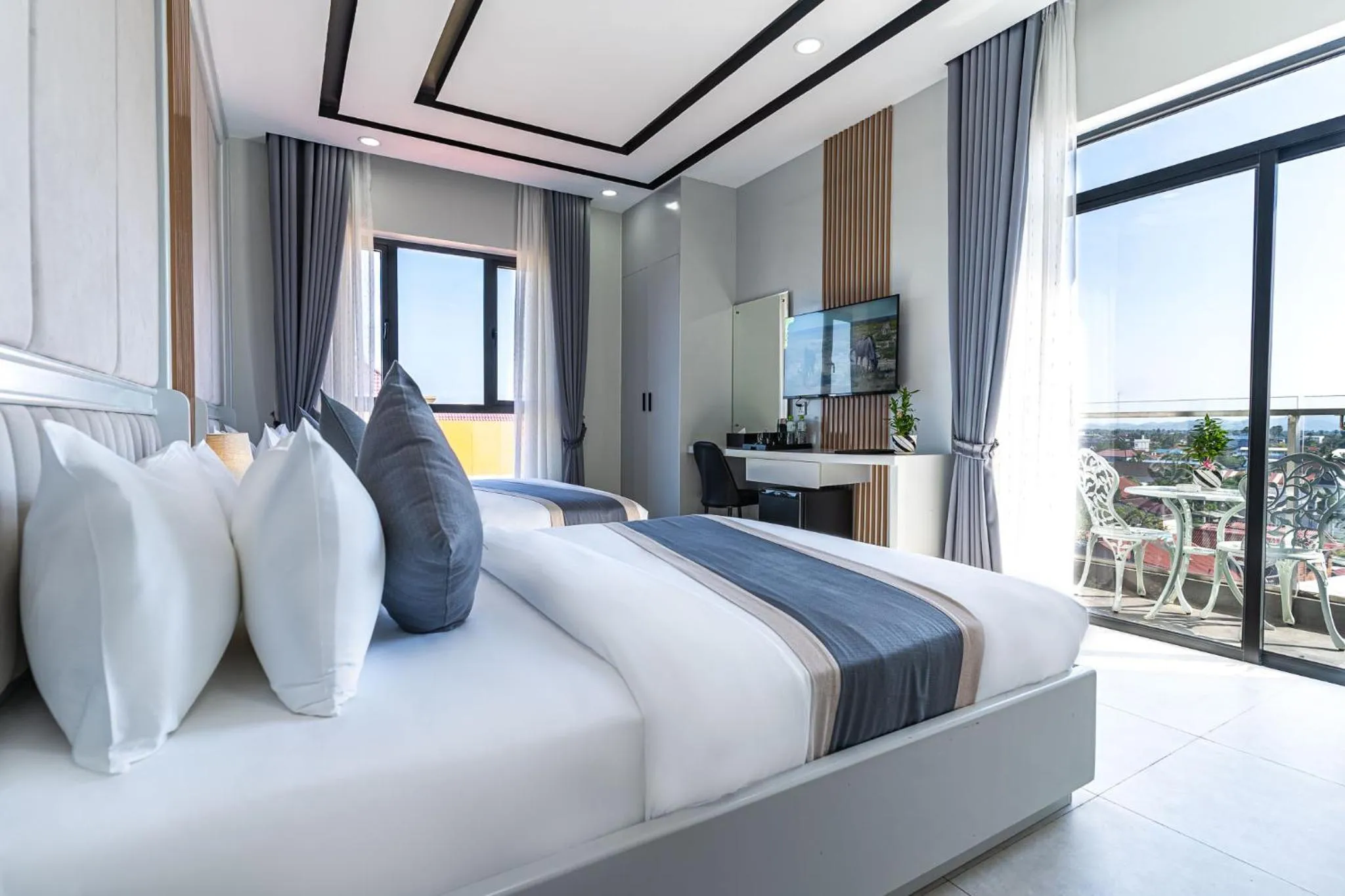 Bed in The Square Kampot Hotel