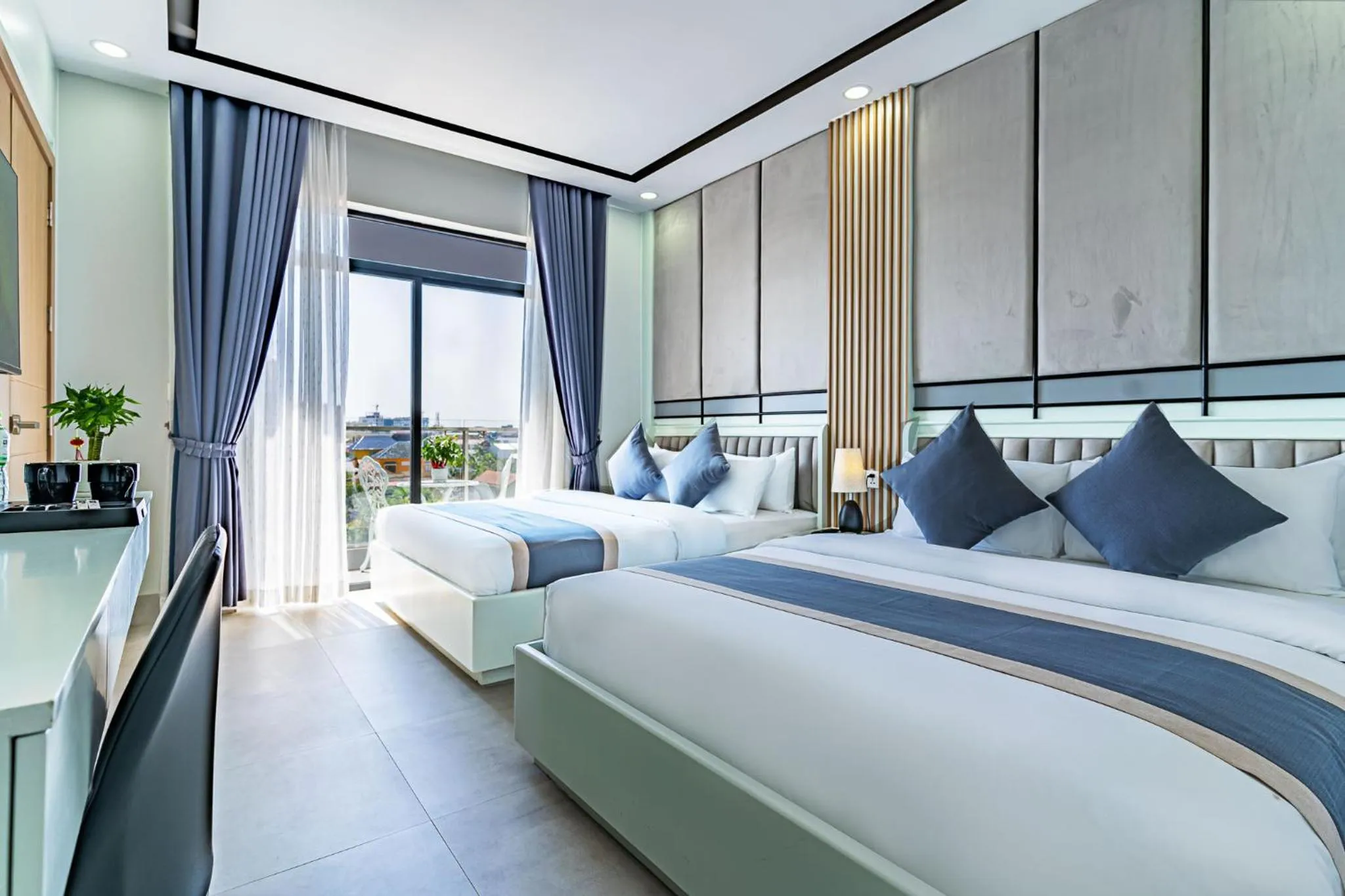 Bed in The Square Kampot Hotel