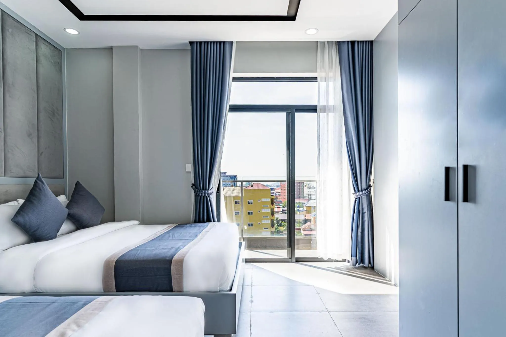 Bed in The Square Kampot Hotel