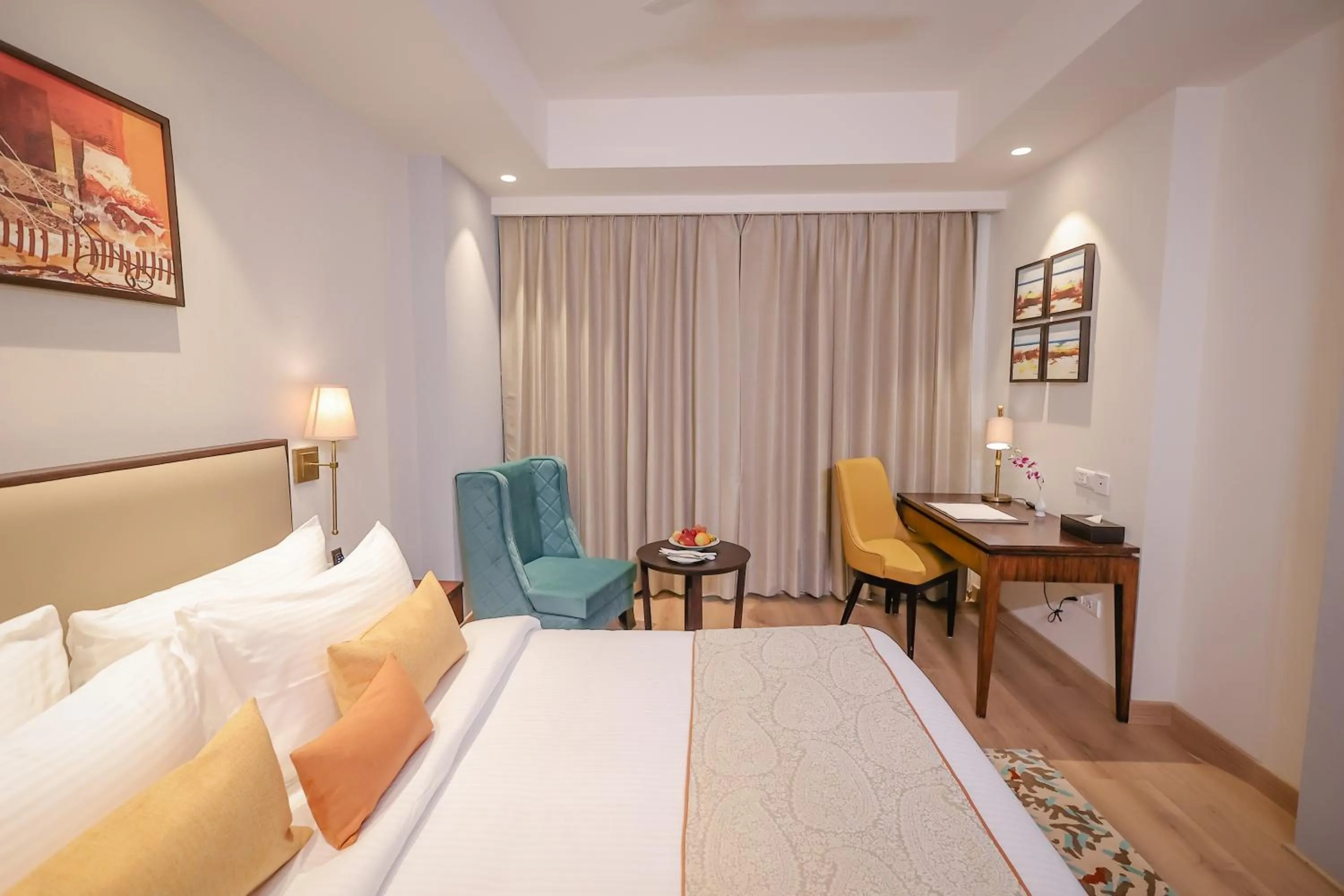 Bed in Regenta Dehradun by Royal Orchid Hotels Limited