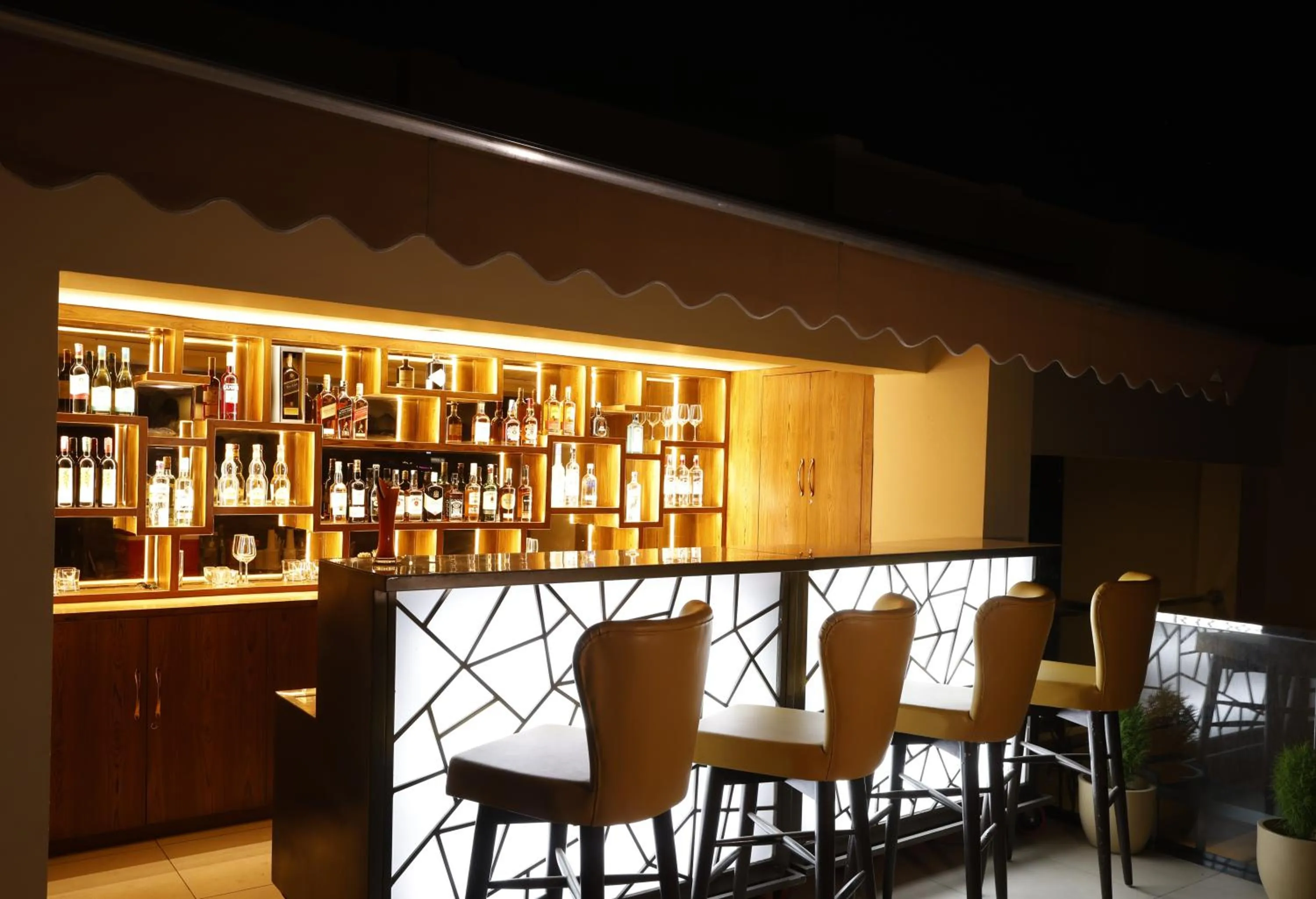Lounge or bar in Regenta Dehradun by Royal Orchid Hotels Limited