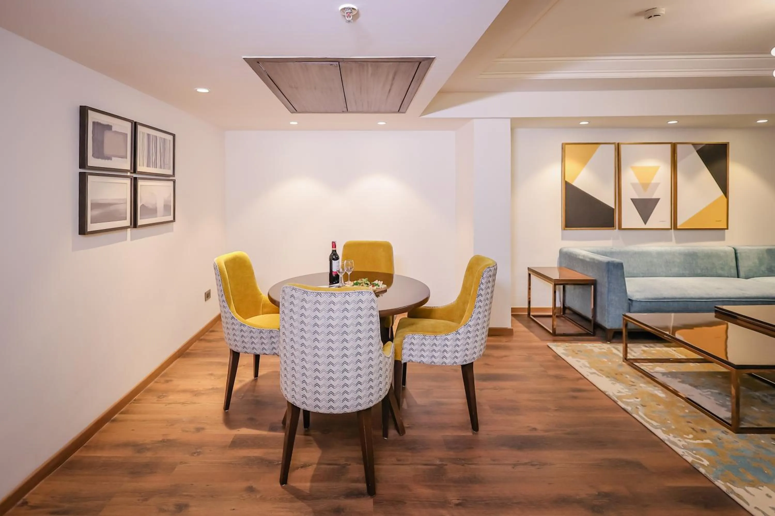 Living room in Regenta Dehradun by Royal Orchid Hotels Limited