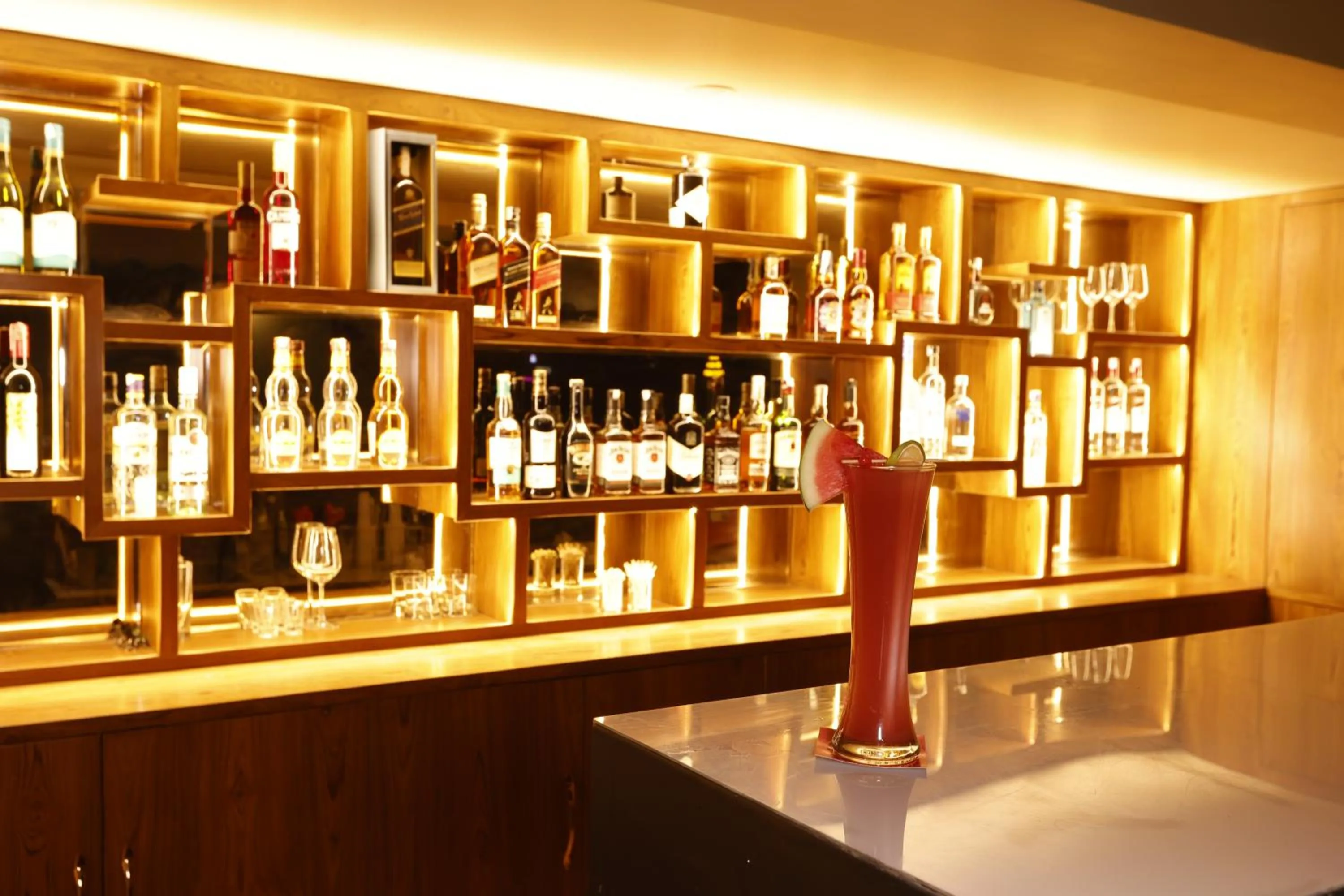 Lounge or bar in Regenta Dehradun by Royal Orchid Hotels Limited