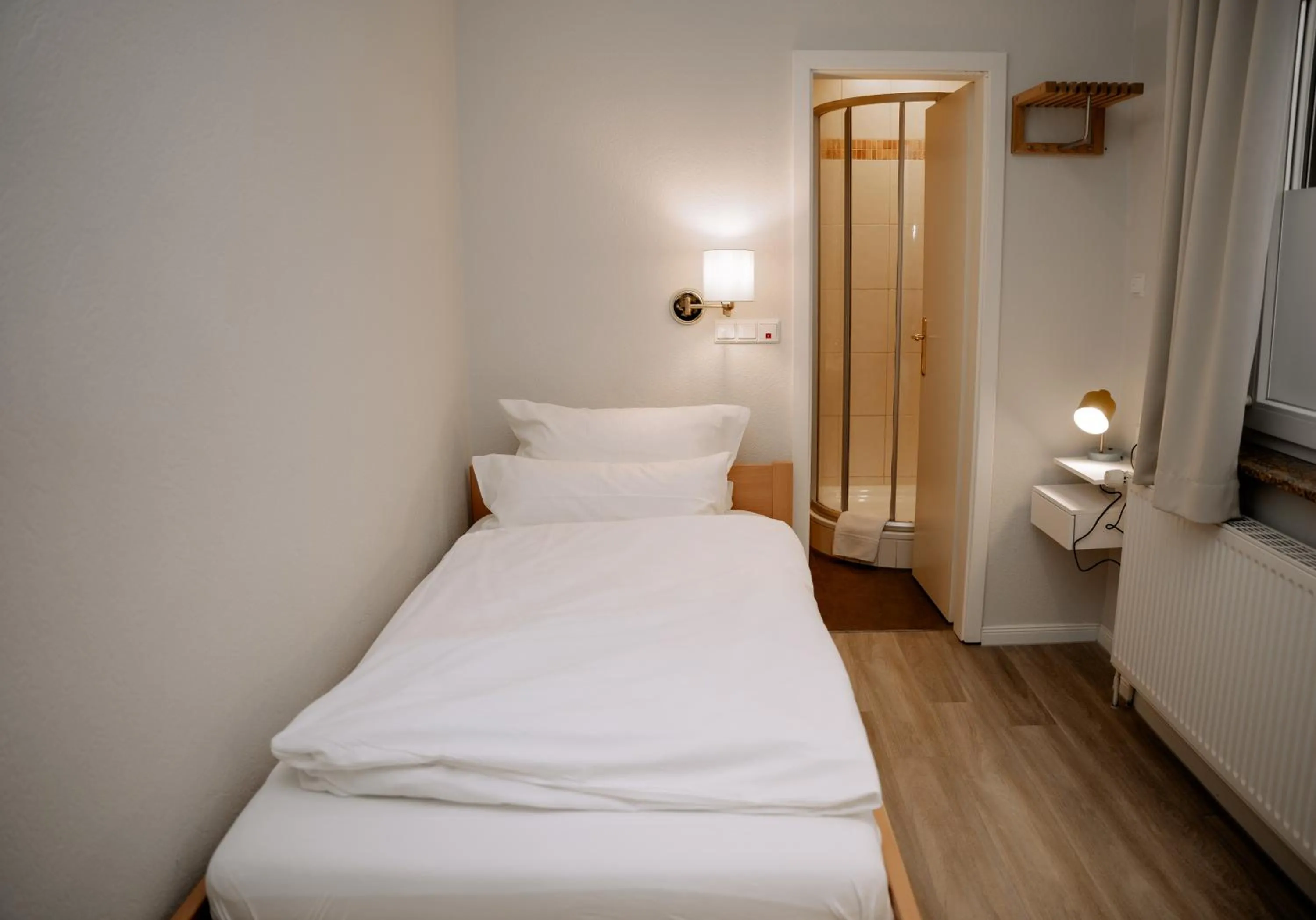 Bed in Hotel Seehof Norderney OHG
