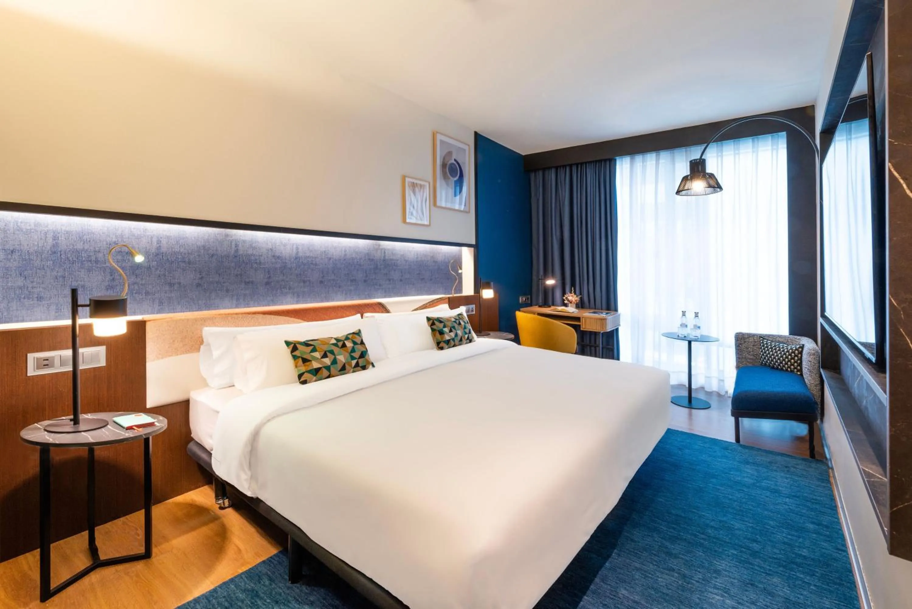 Photo of the whole room, Bed in Crowne Plaza Madrid - Centre Retiro by IHG