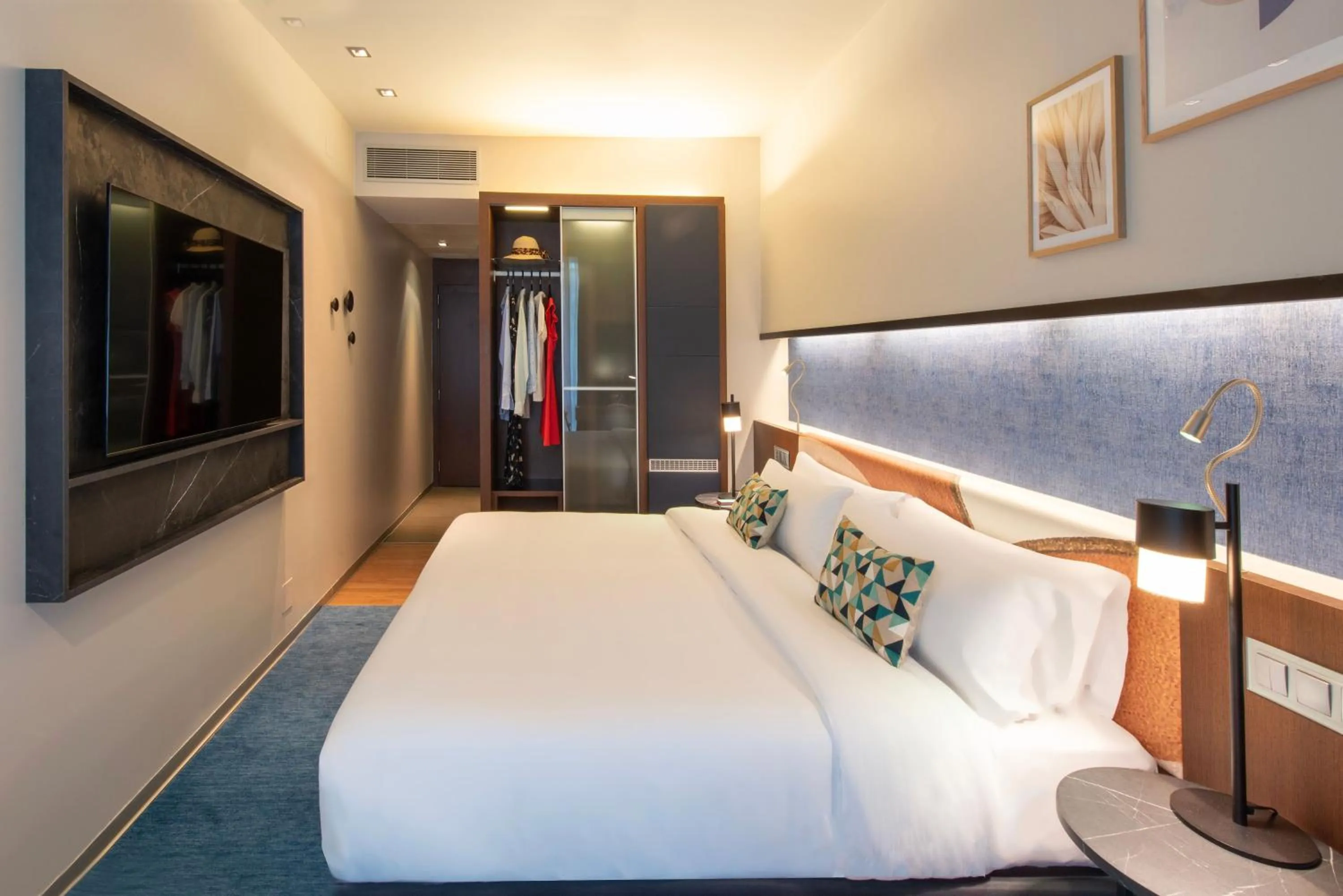 Photo of the whole room, Bed in Crowne Plaza Madrid - Centre Retiro by IHG