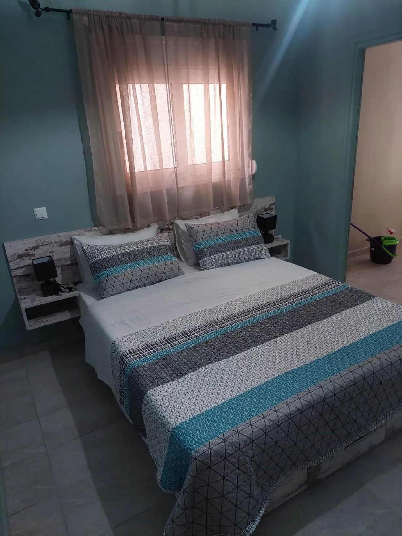 Bed in Akrotiri Luxury Suites