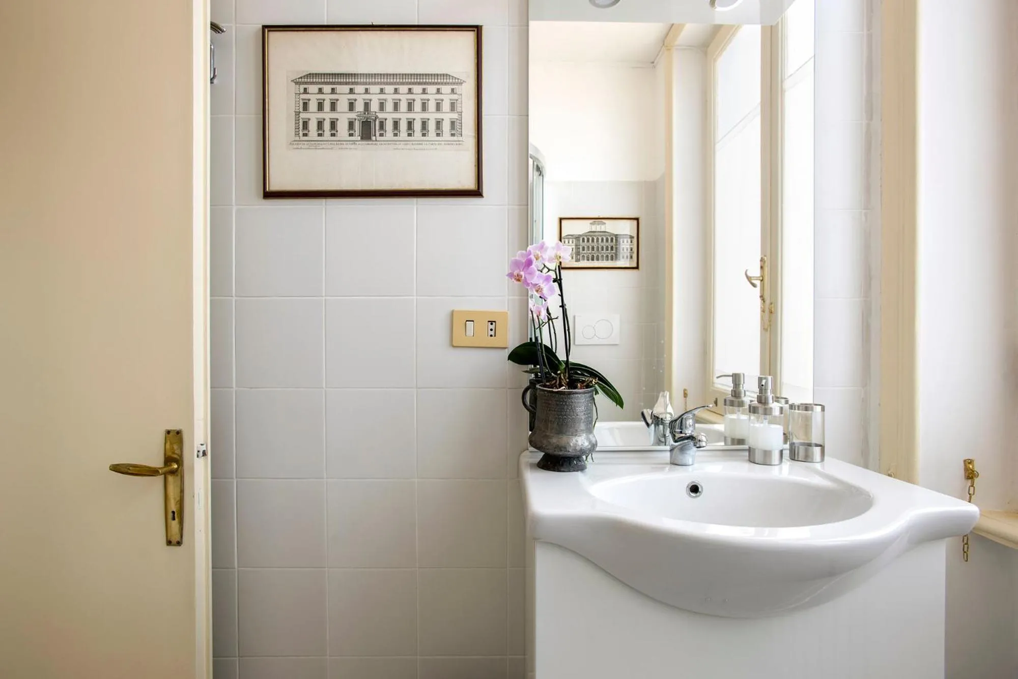 Bathroom in ""Bright Top Floor Apartment Vatican & Tiber View, Steps from Olympic Stadium"