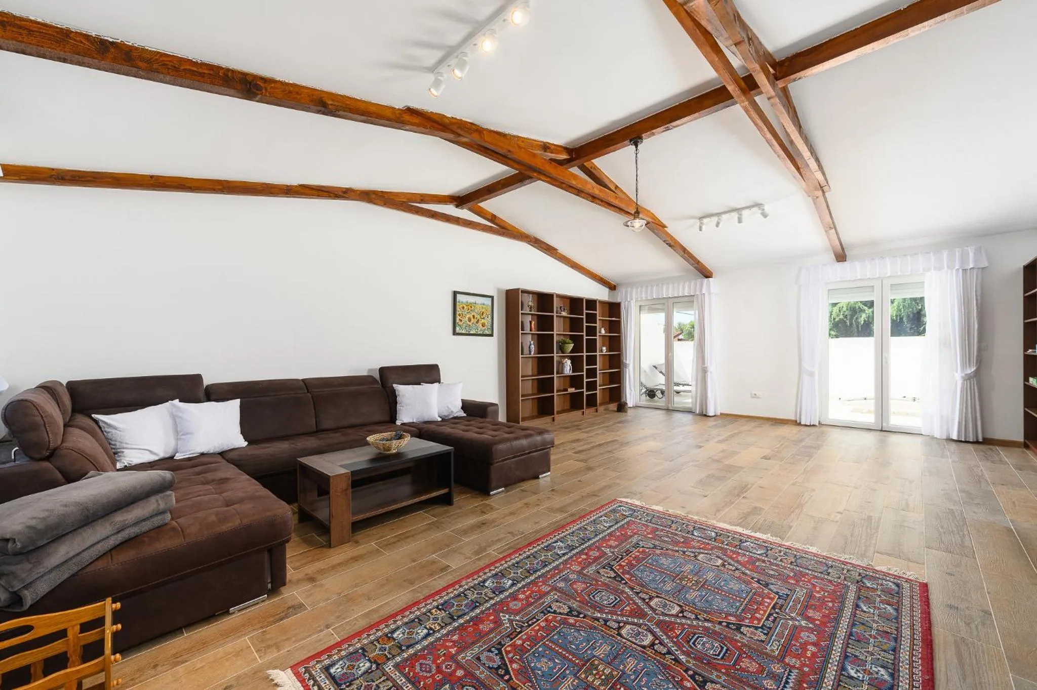 Communal lounge/ TV room in Villa Gigi