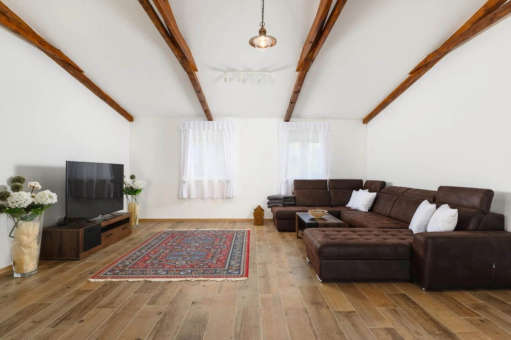 Communal lounge/ TV room in Villa Gigi