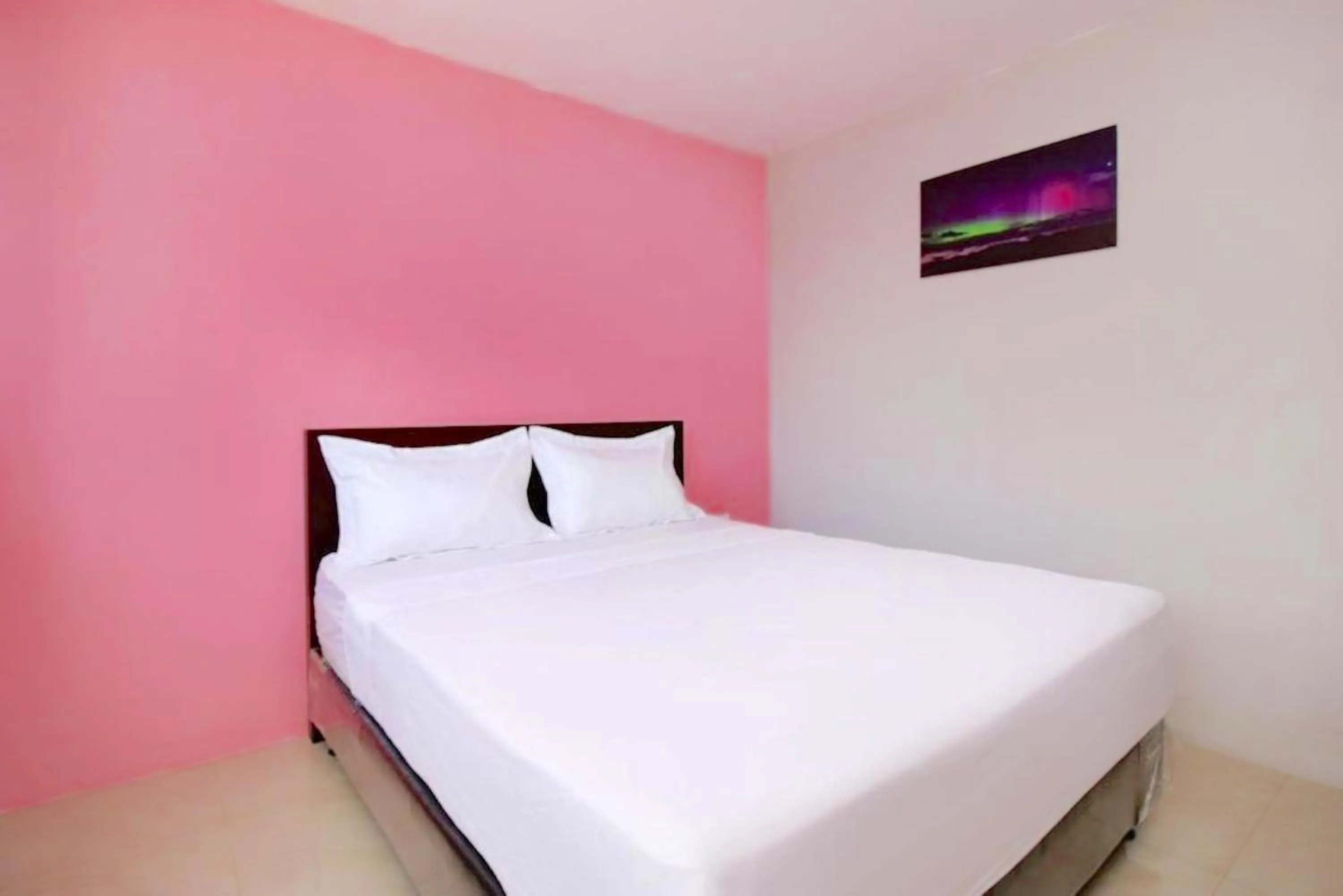 Bed in The Aurora by Makati