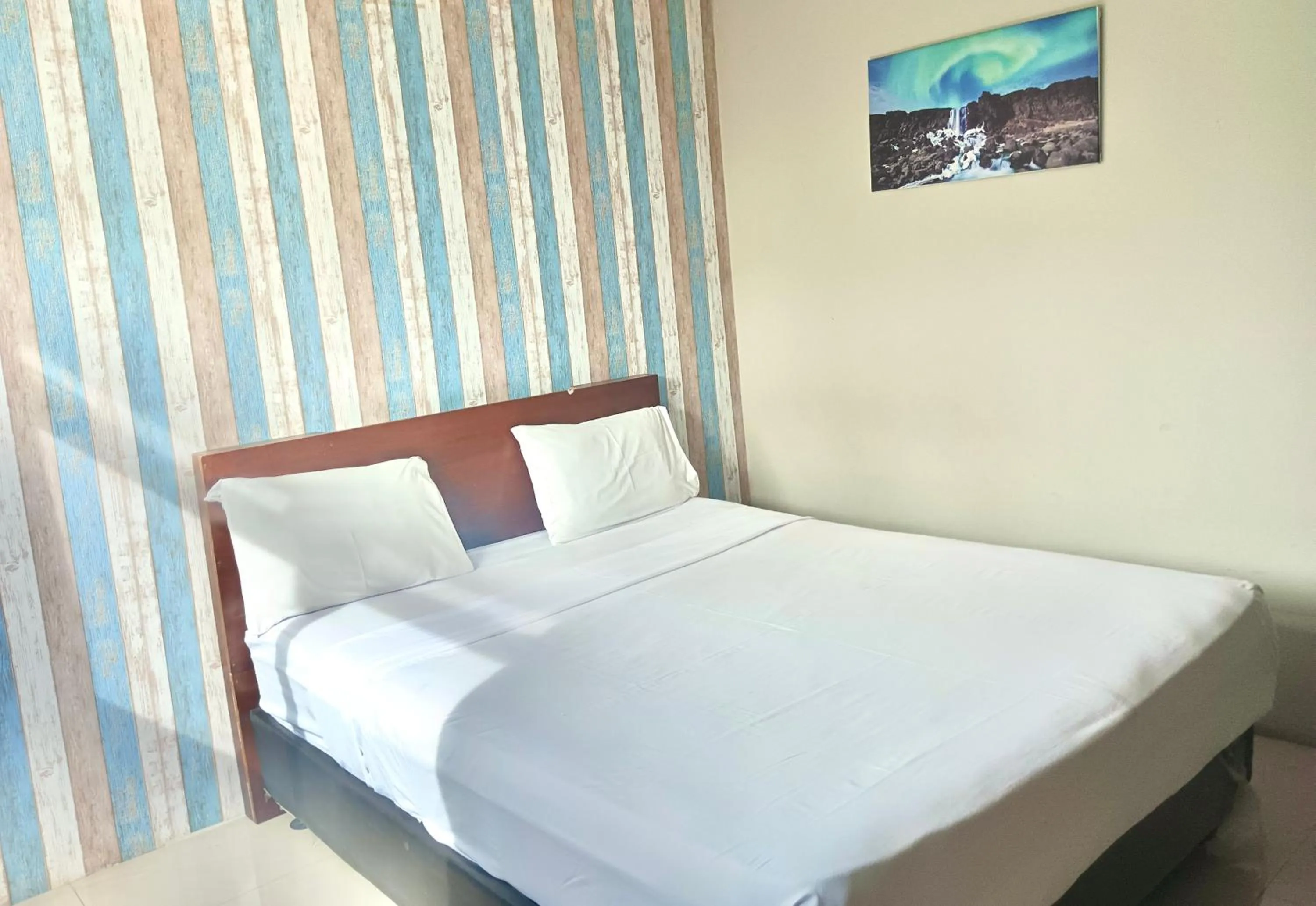 Bed in The Aurora by Makati