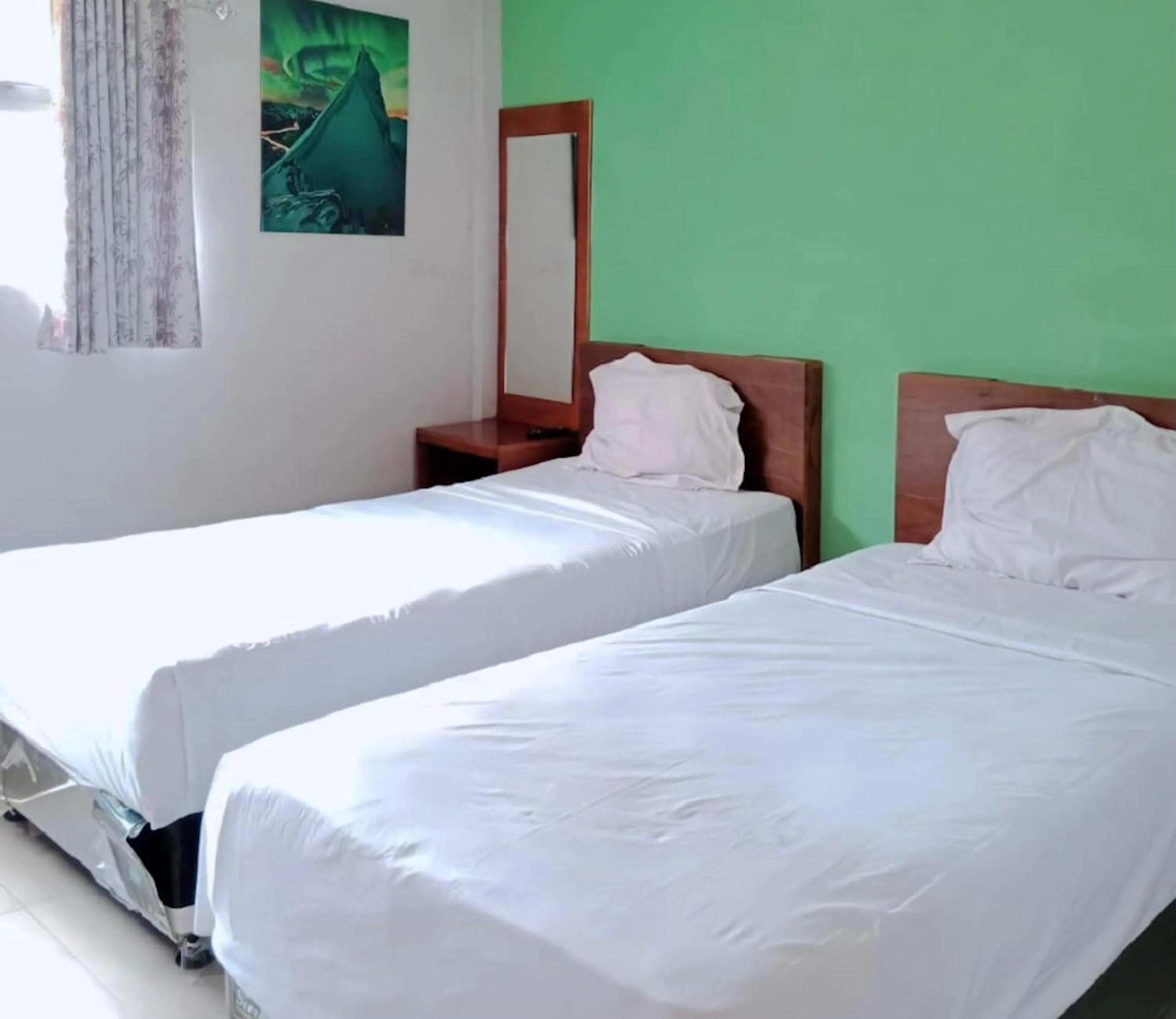 Bed in The Aurora by Makati