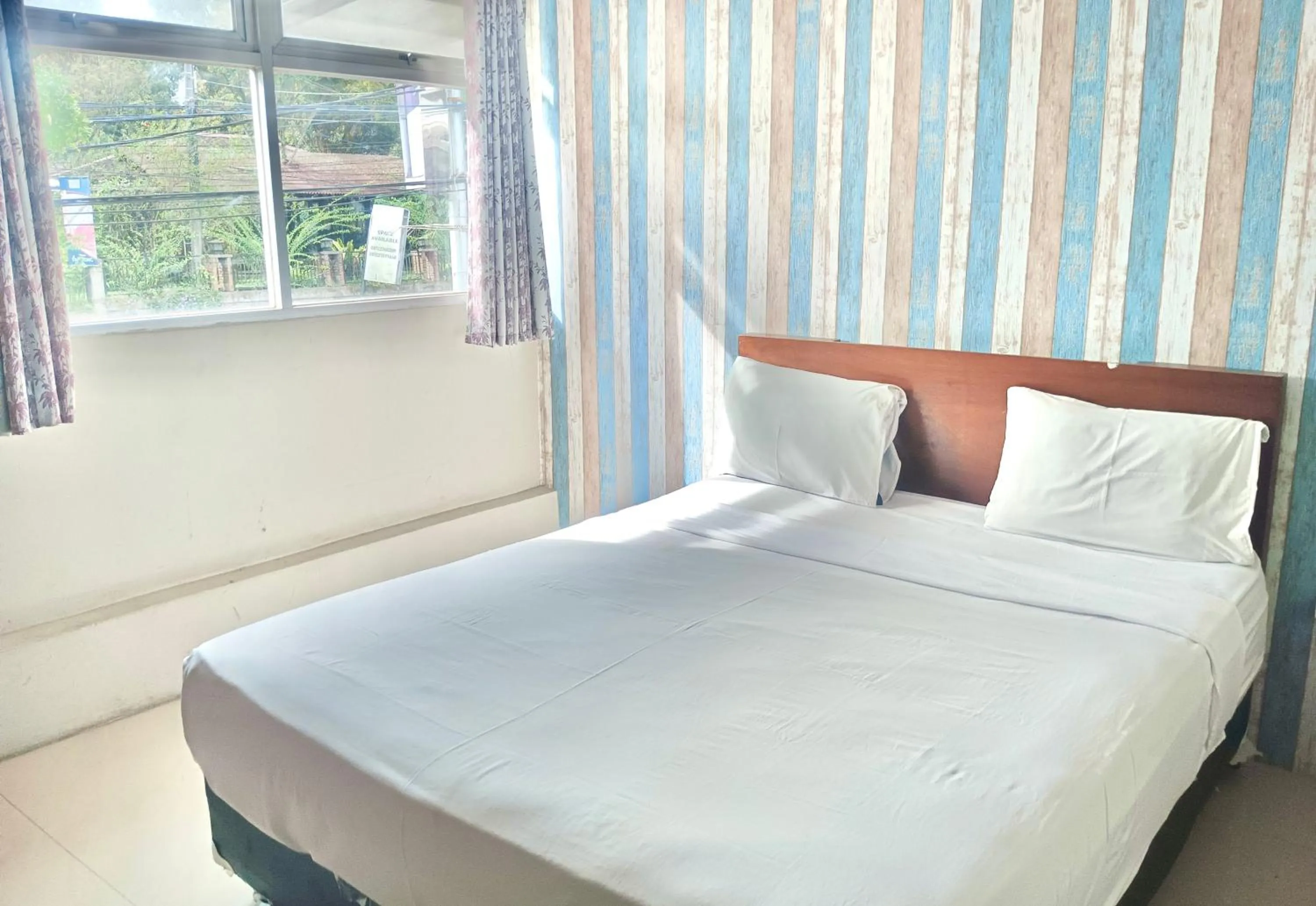 Bed in The Aurora by Makati