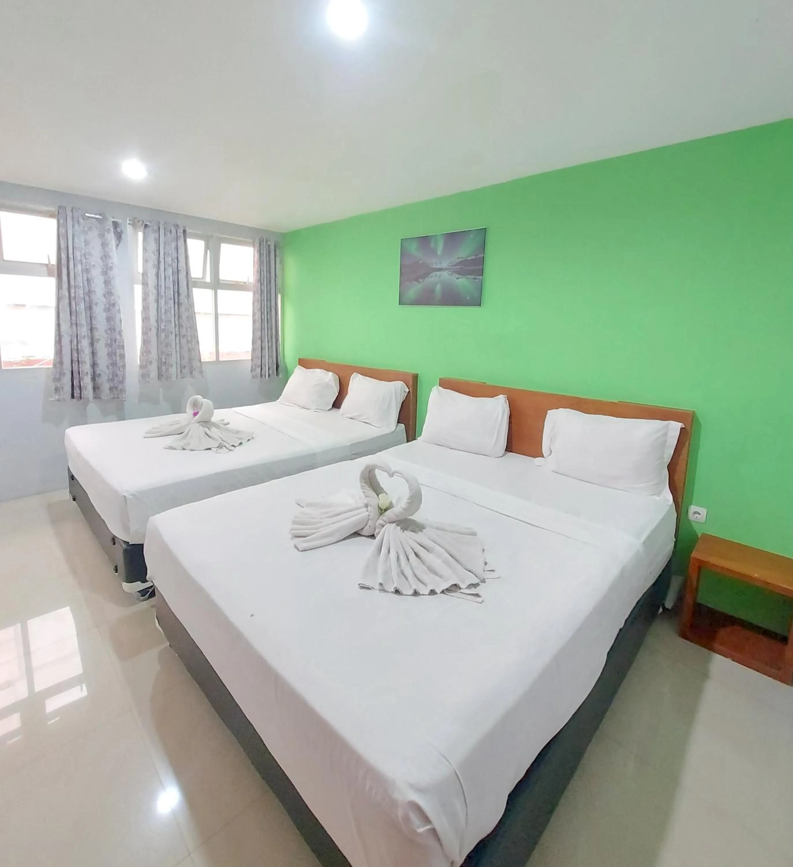 Bed in The Aurora by Makati