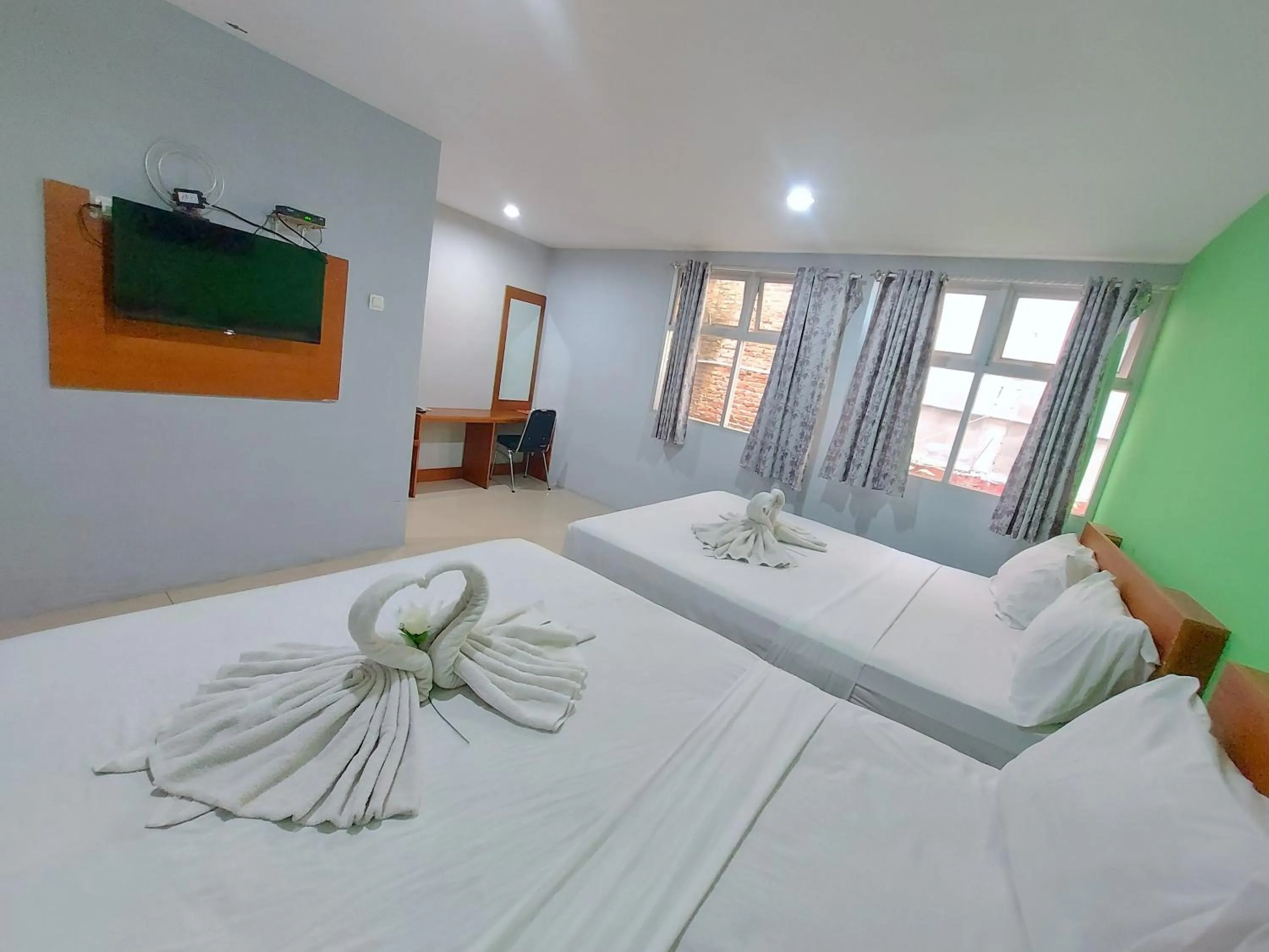 Bed in The Aurora by Makati