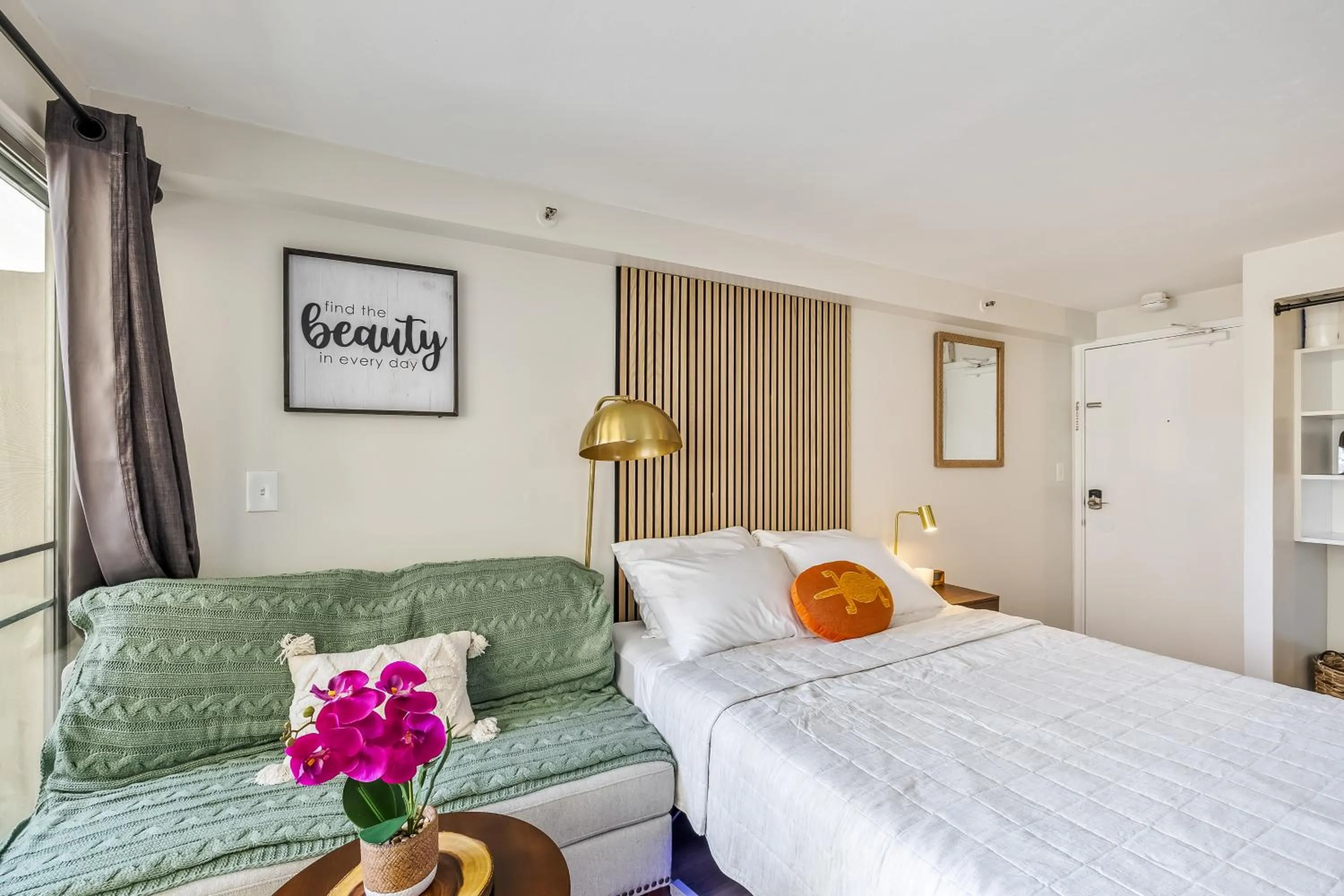 Bed in Bright & Cozy Condo Unit with Balcony!