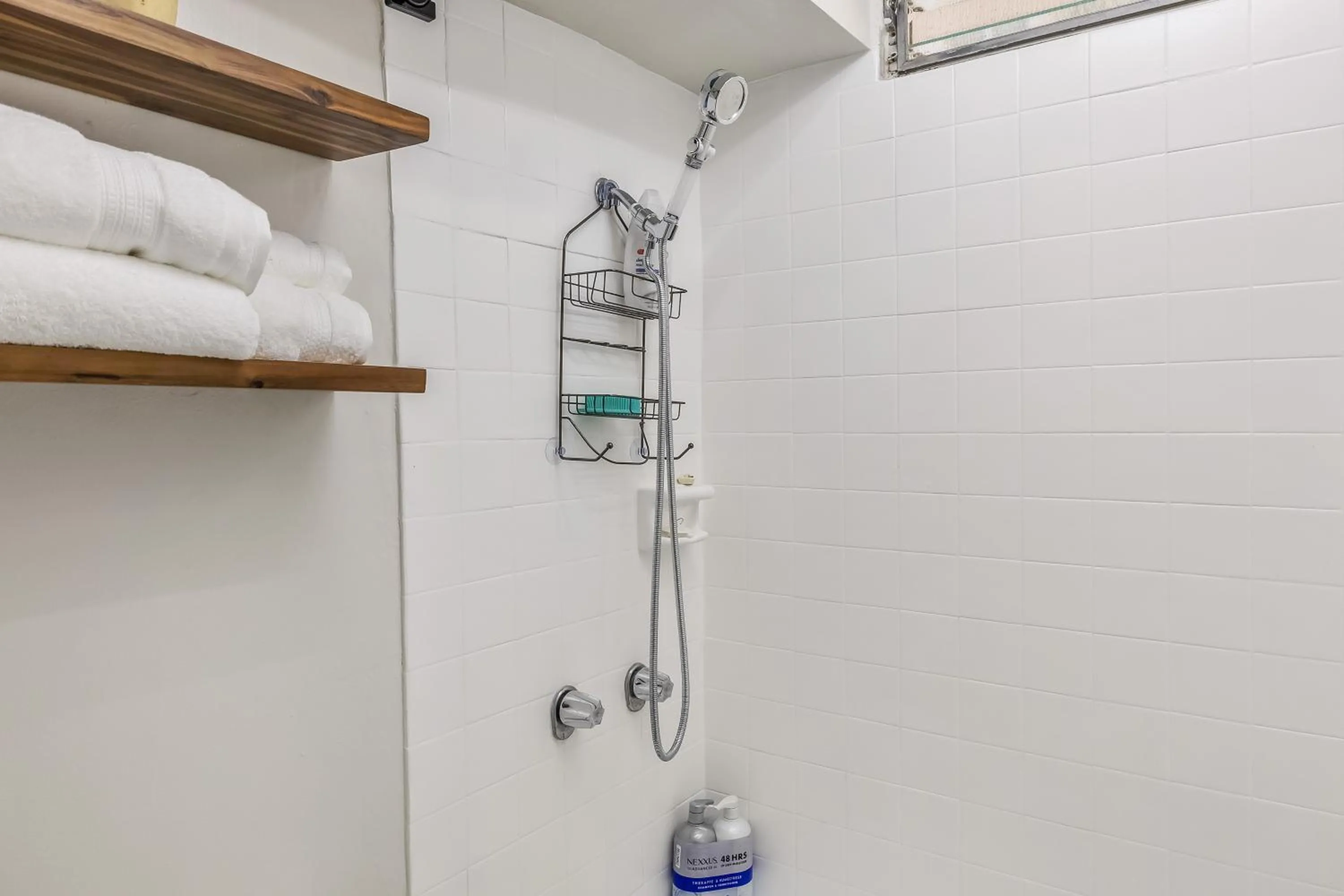 Shower in Bright & Cozy Condo Unit with Balcony!
