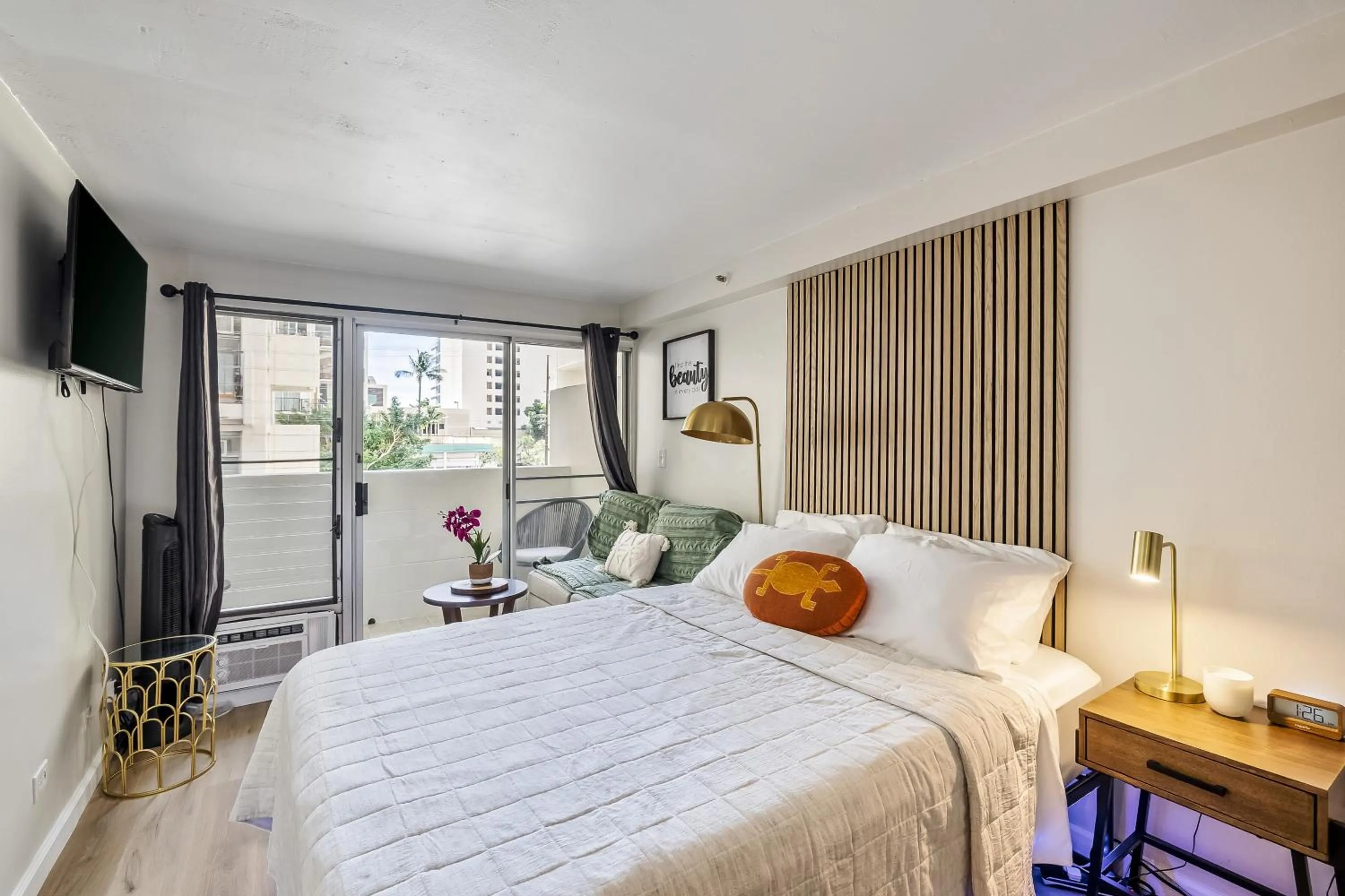 Bedroom in Bright & Cozy Condo Unit with Balcony!