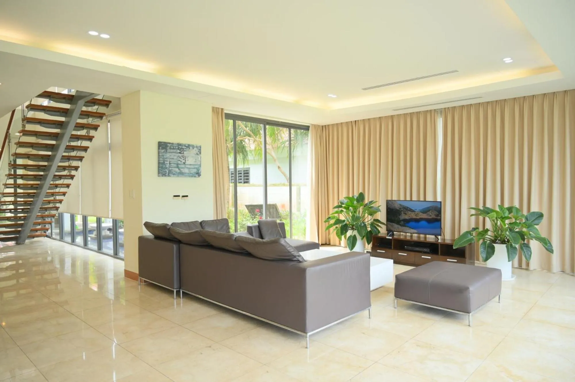 TV and multimedia in Memories Holiday beach villa Da Nang