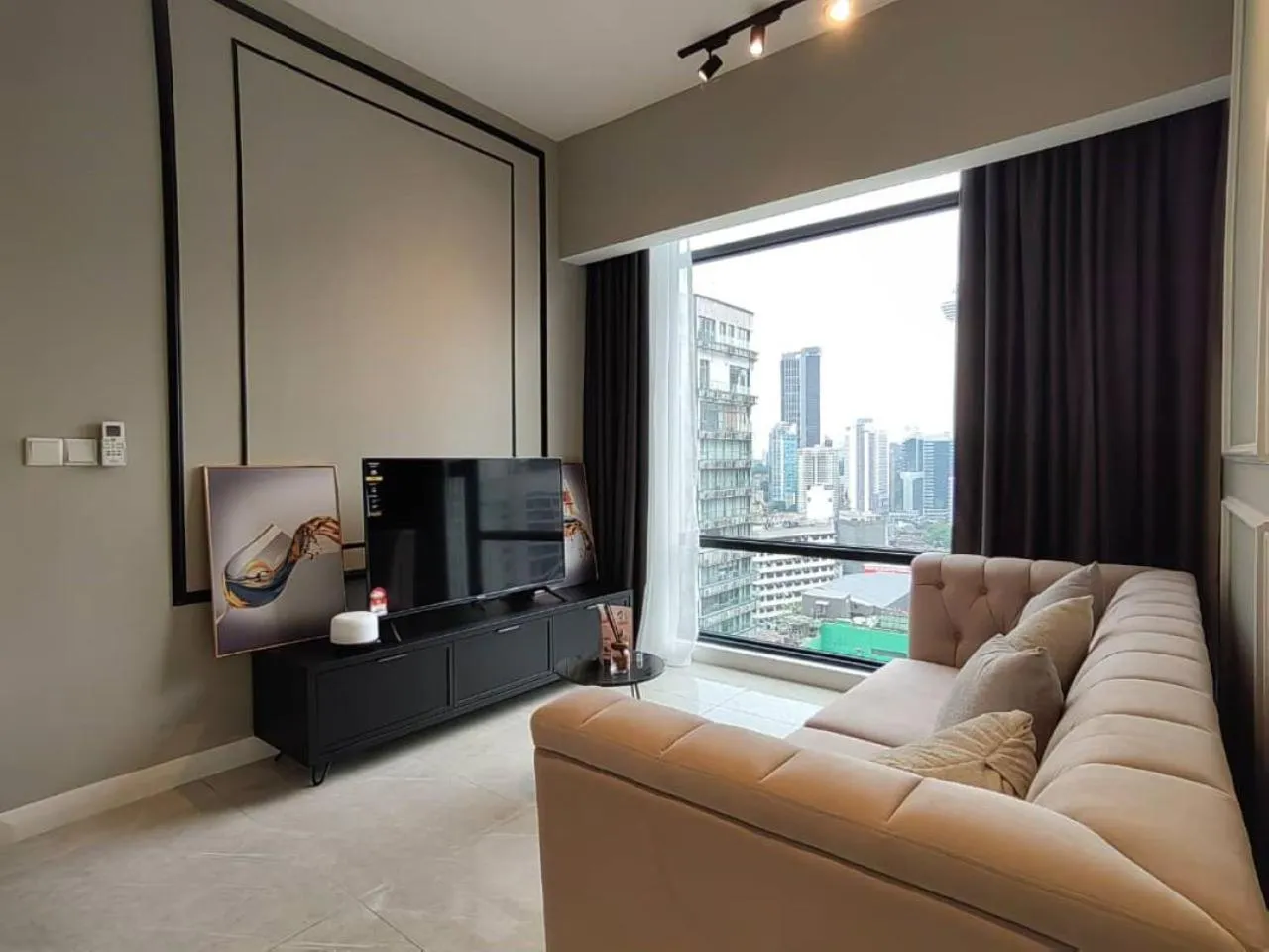 Living room in The Axon Bukit Bintang by SMOVF BNB