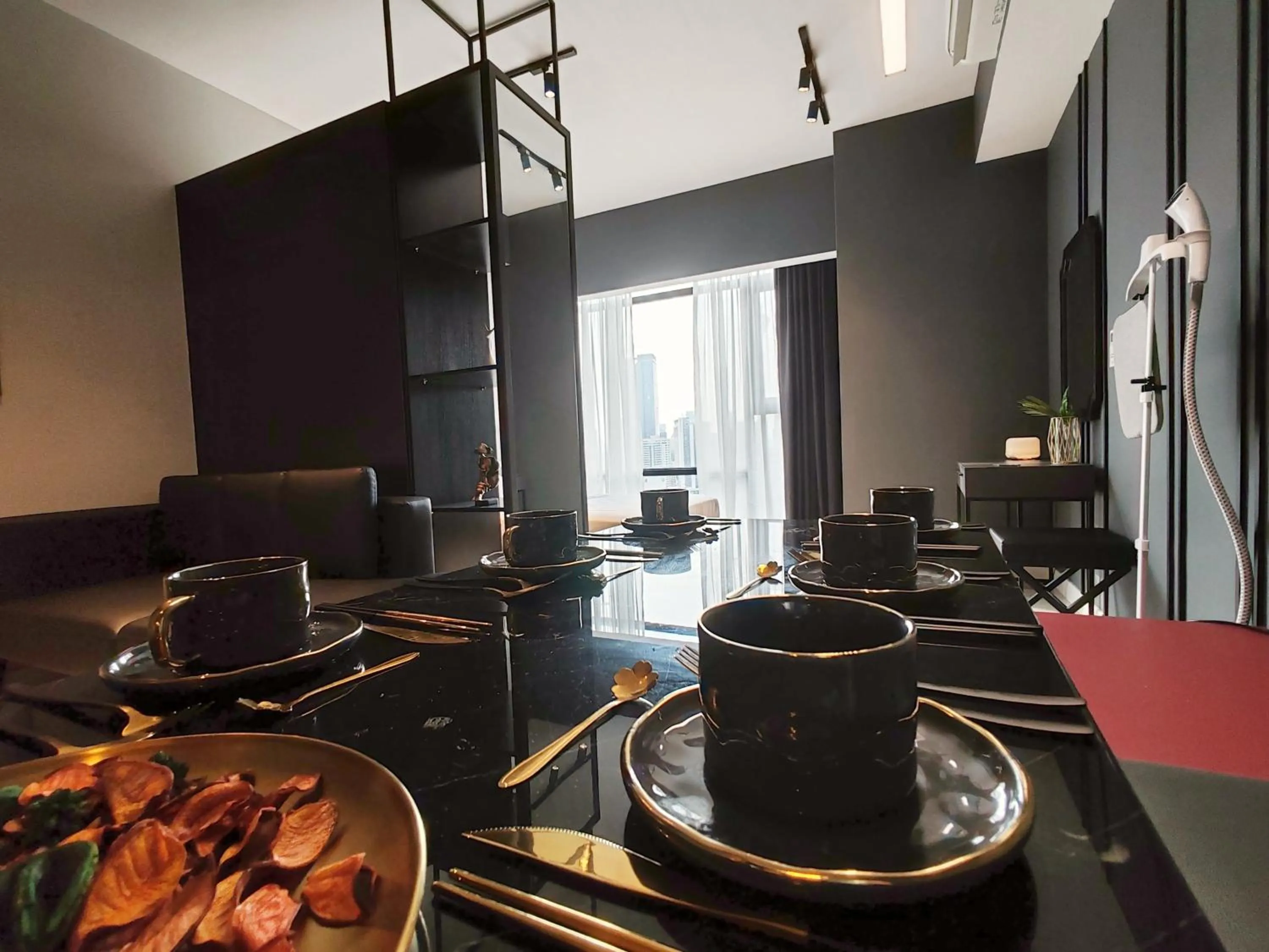 Living room in The Axon Bukit Bintang by SMOVF BNB