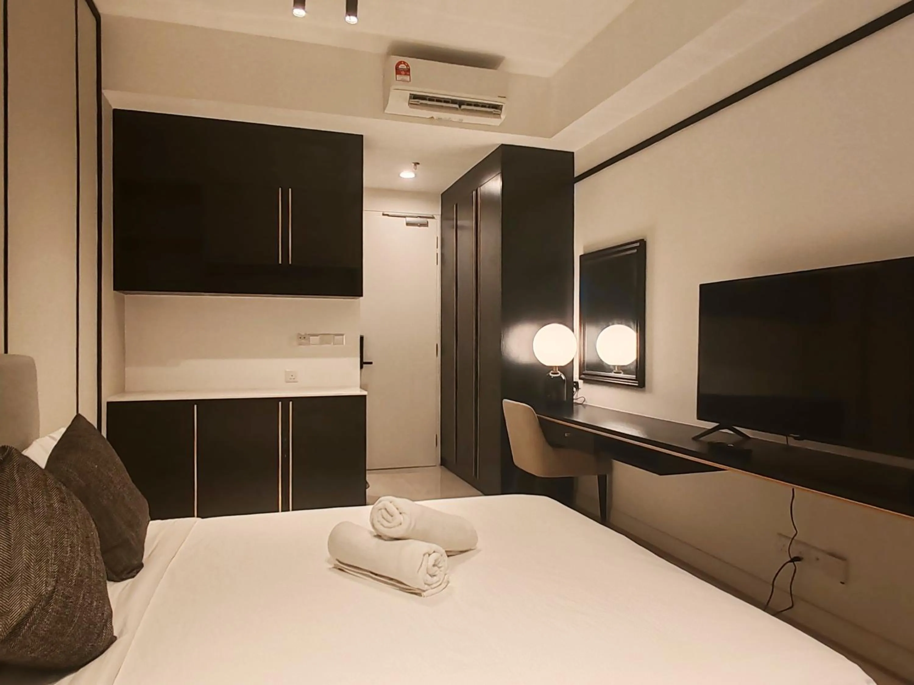 Bed in The Axon Bukit Bintang by SMOVF BNB