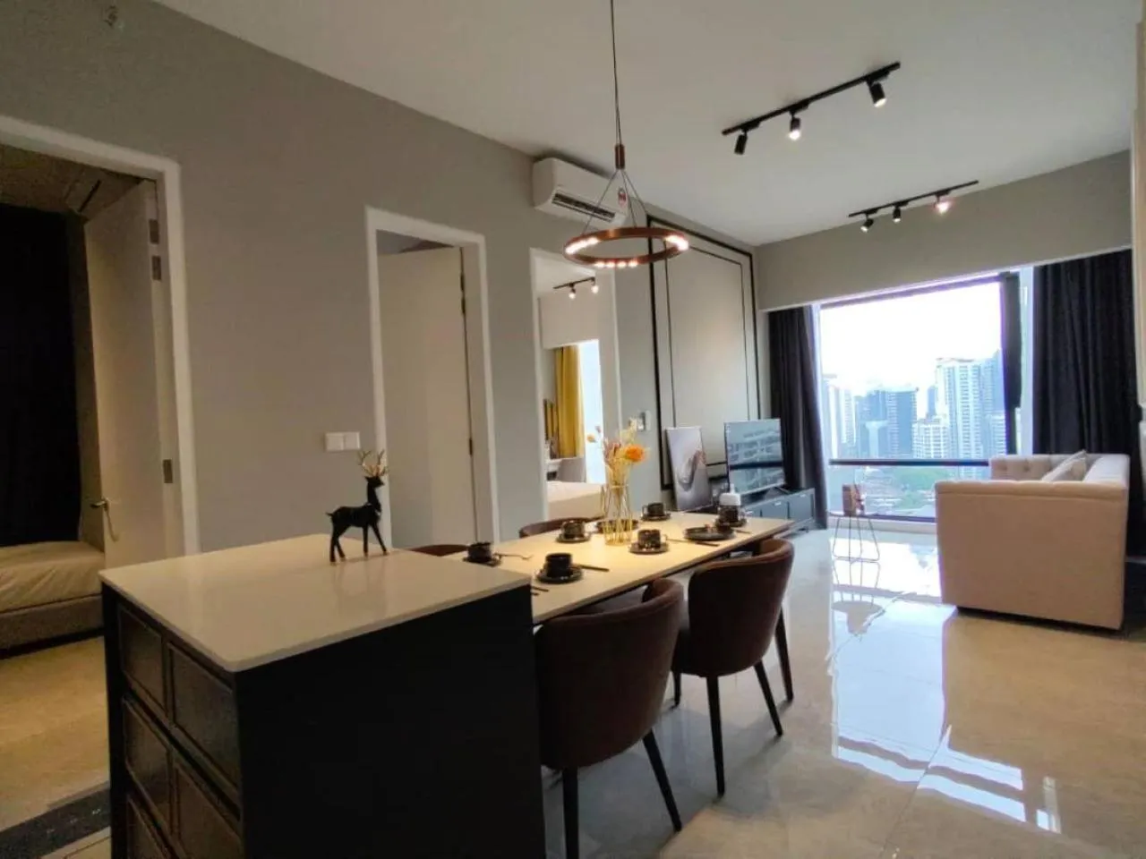 Living room in The Axon Bukit Bintang by SMOVF BNB