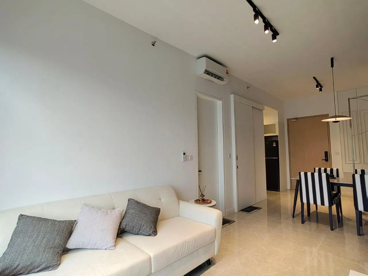 Living room in The Axon Bukit Bintang by SMOVF BNB