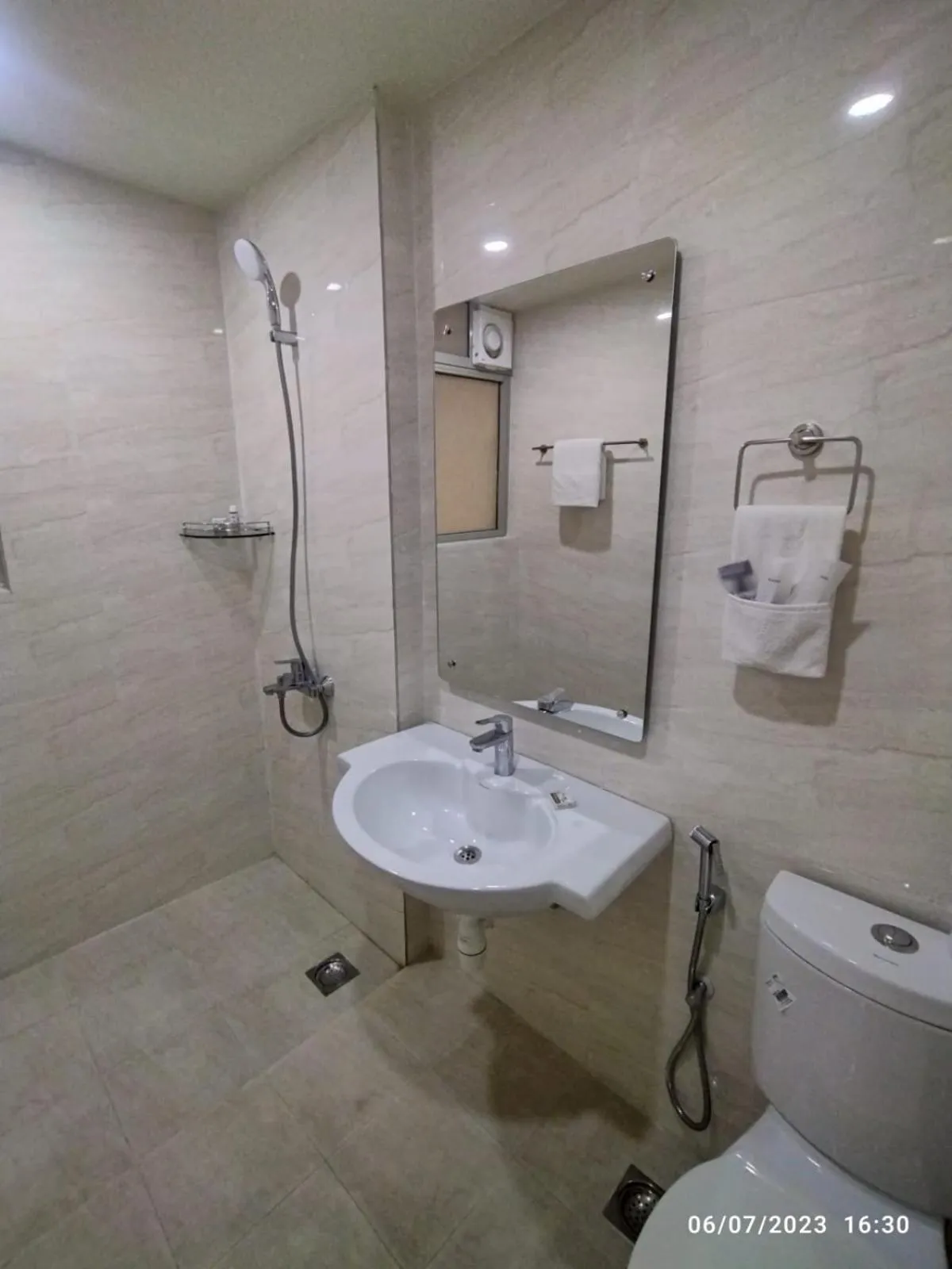 Toilet in Apartel by Aarin - Oragadam