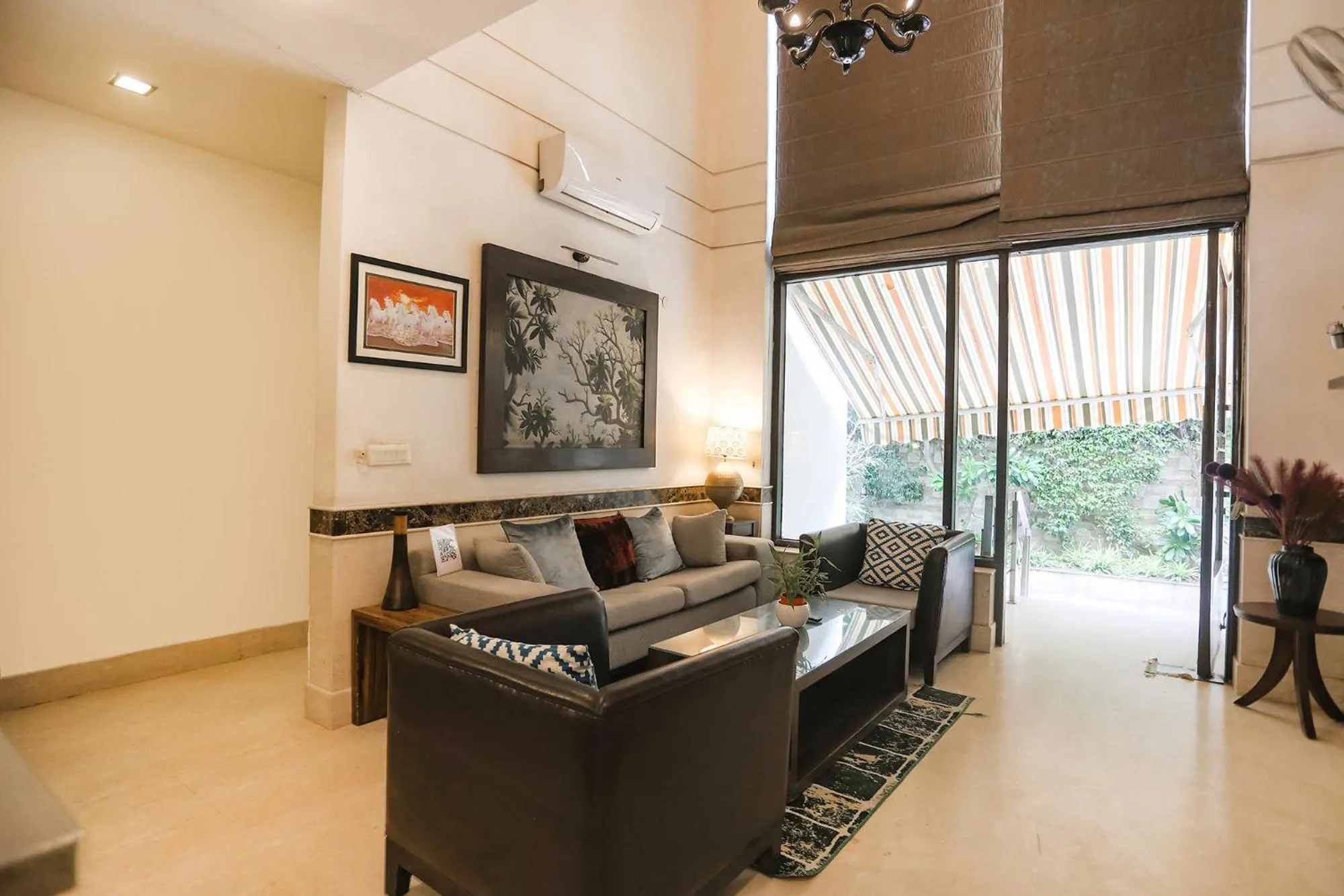 Seating area in FabHotel Rivlet Residency