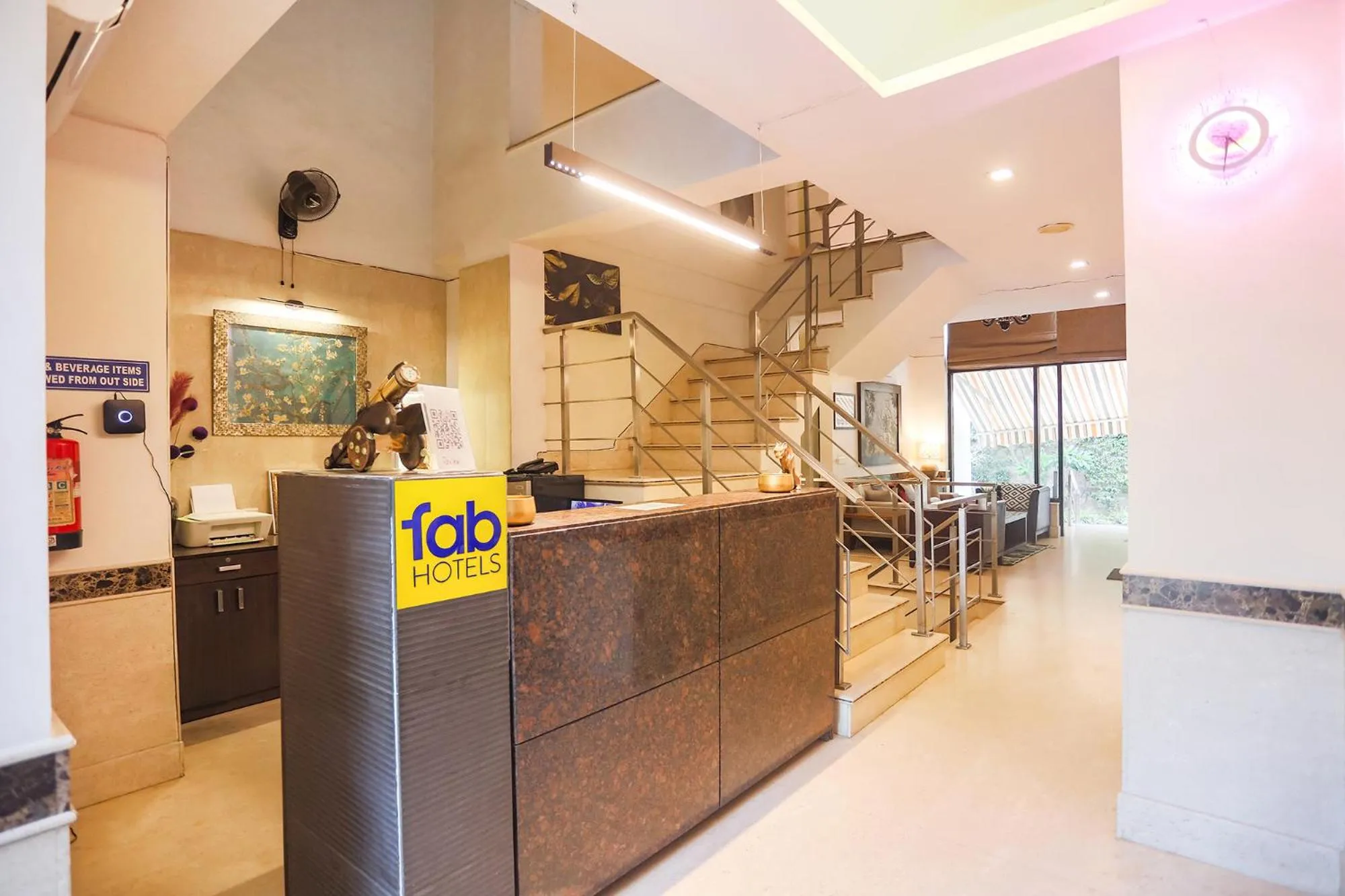 Lobby or reception in FabHotel Rivlet Residency