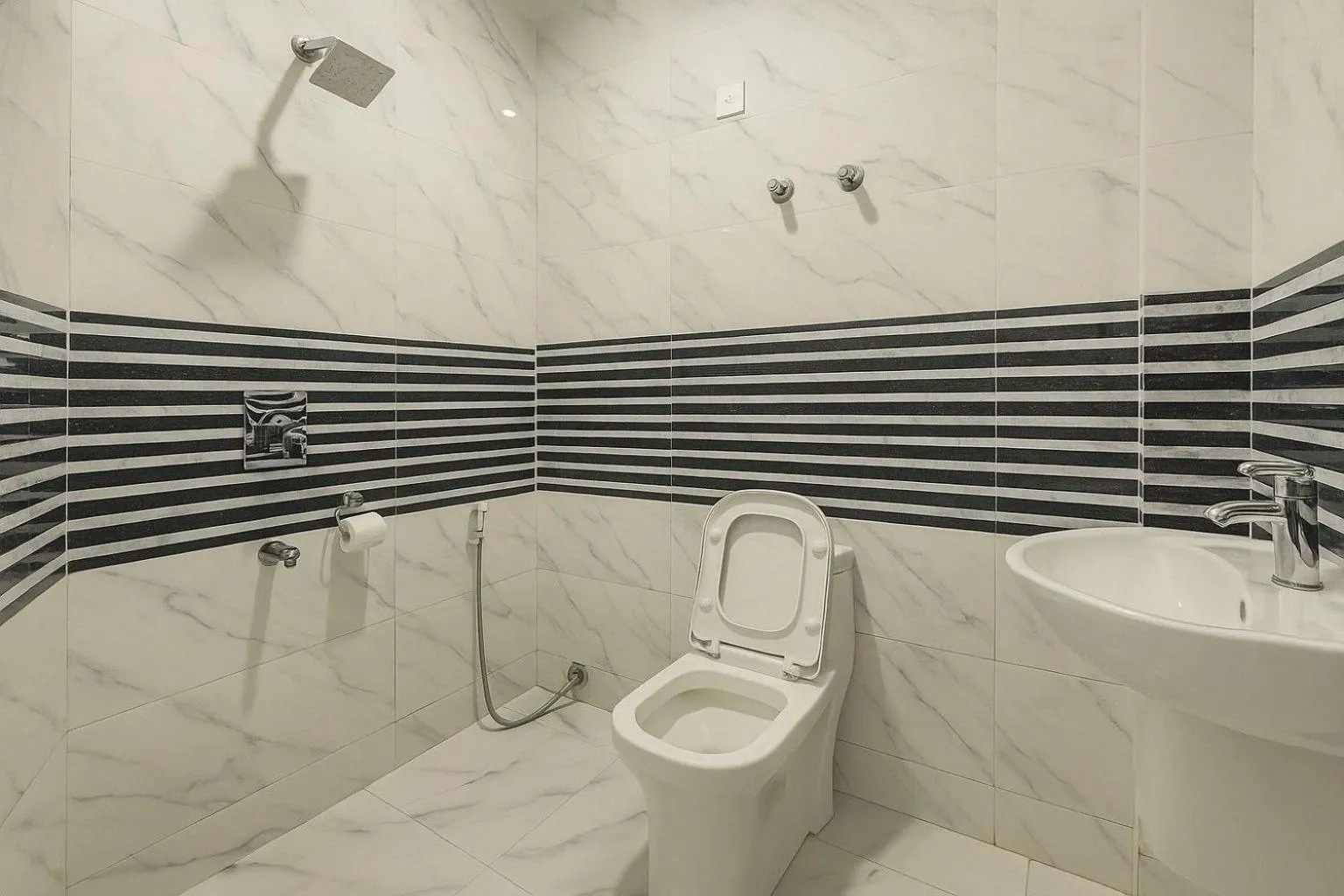 Bathroom in Hotel O Happy Stay