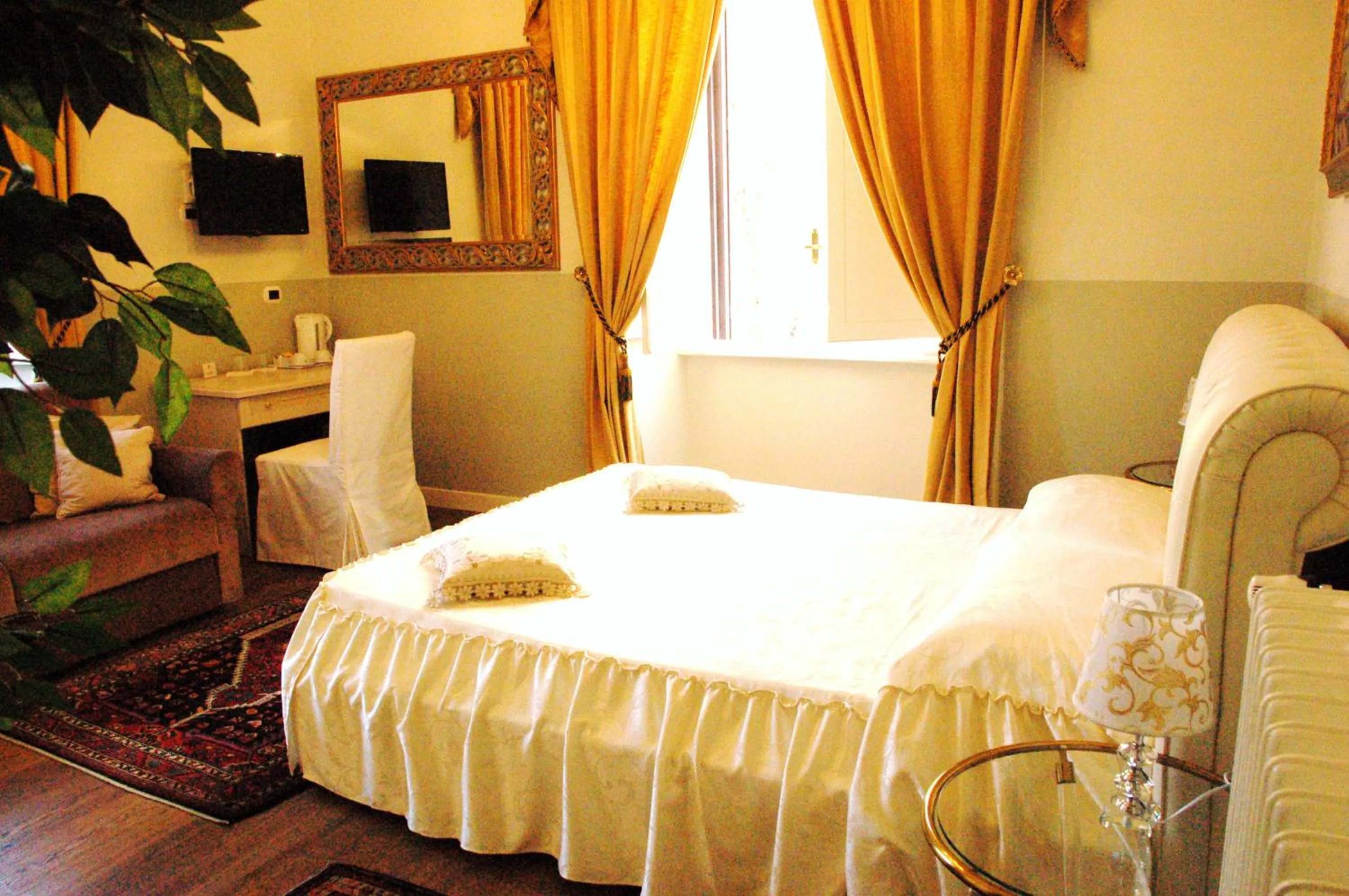 Bed in Charme Holidays Colosseum