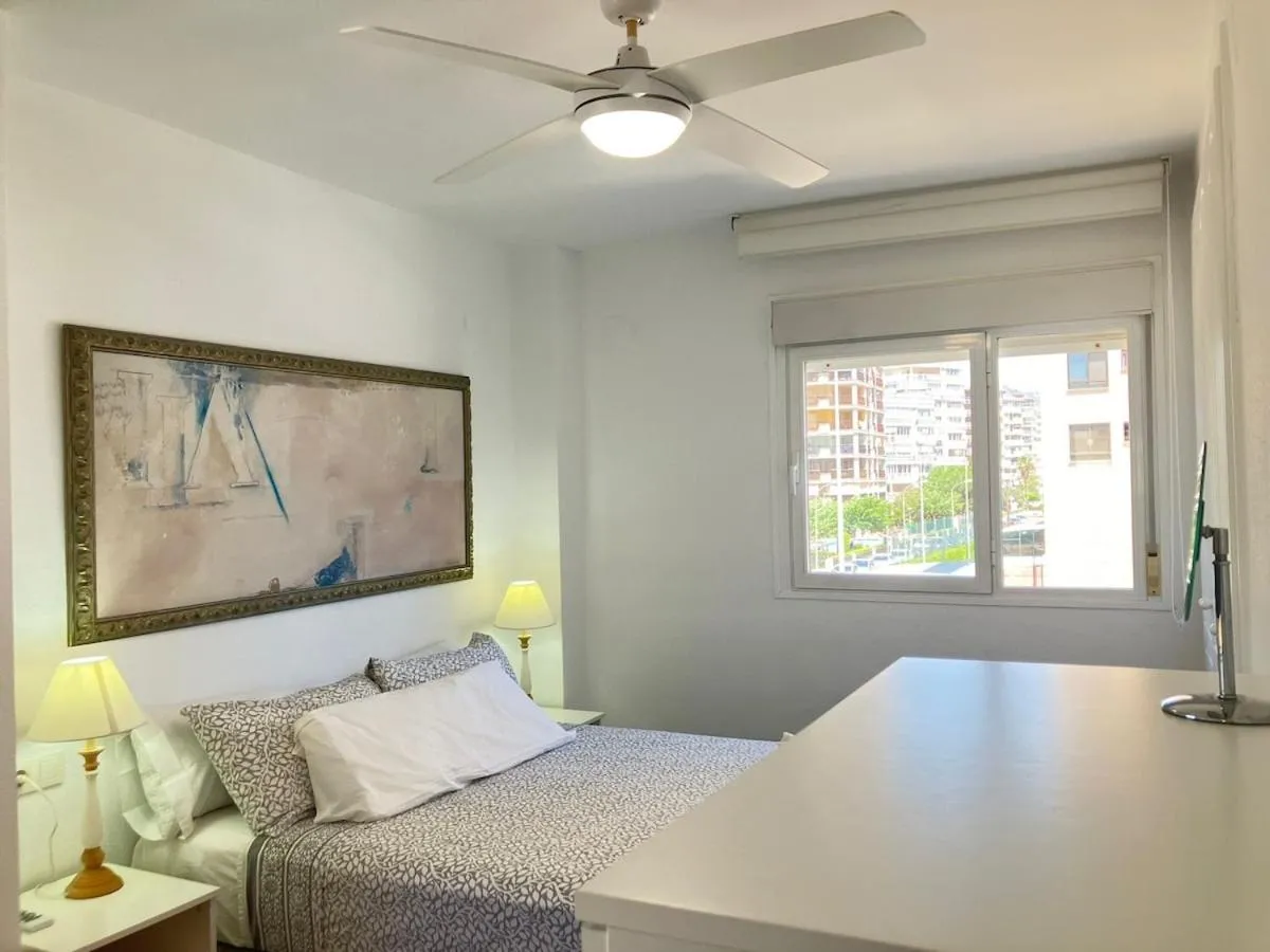 Bed in Seaside Apartment Retreat