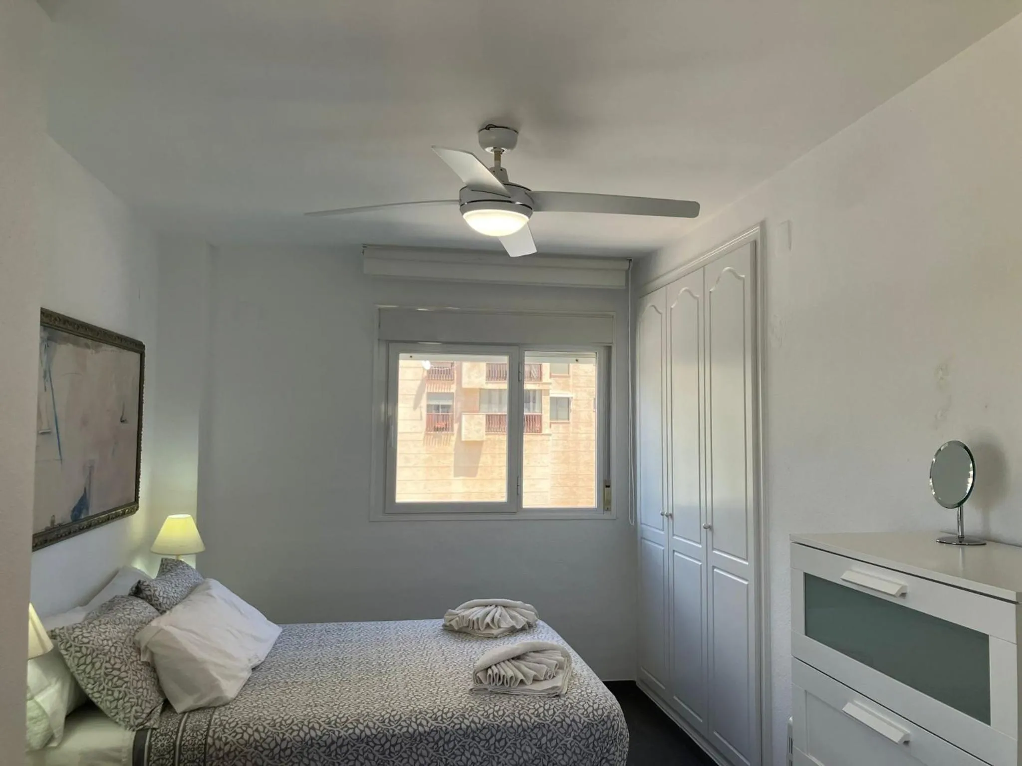 Bed in Seaside Apartment Retreat