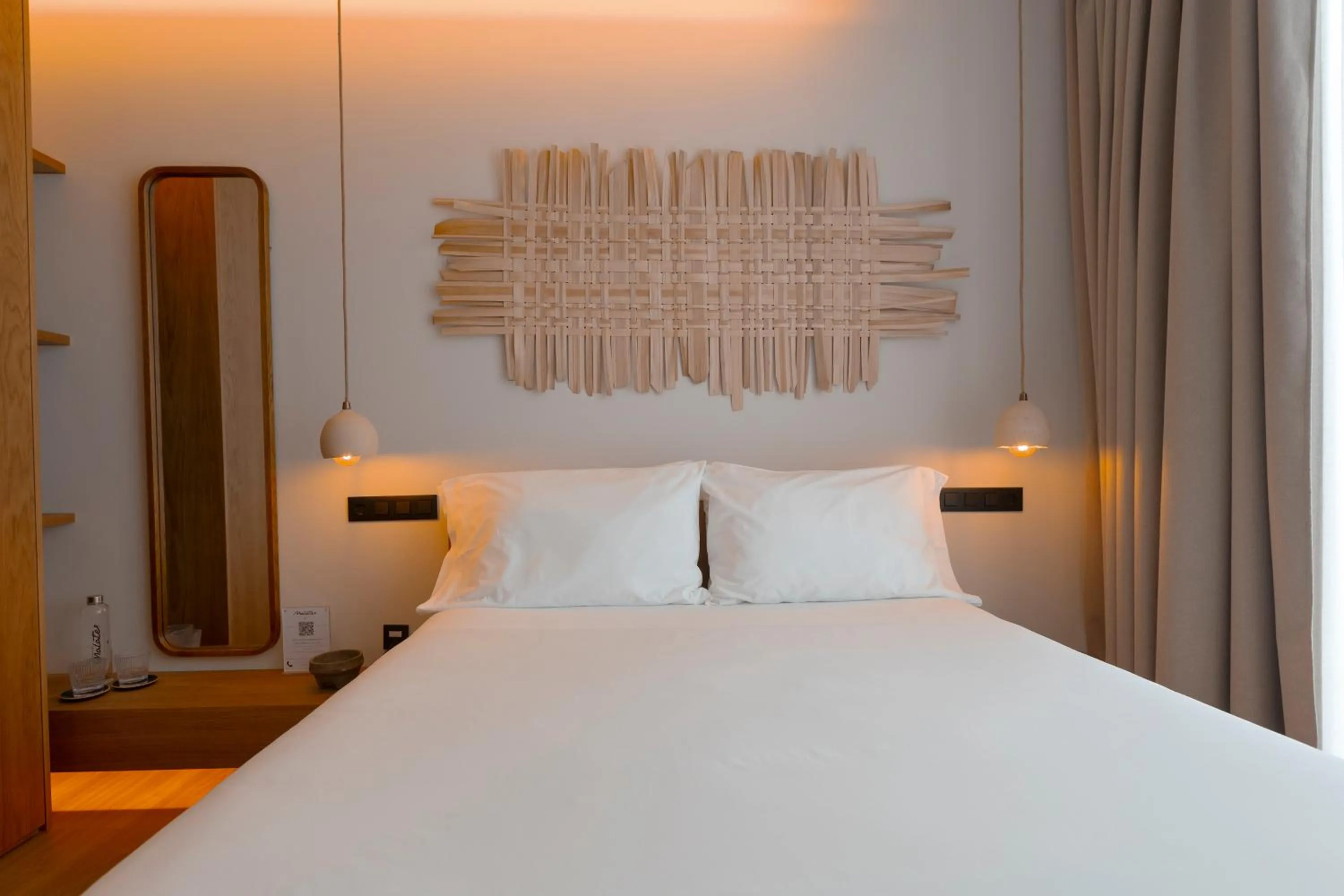 Bed in Malates Slow Boutique Hotel