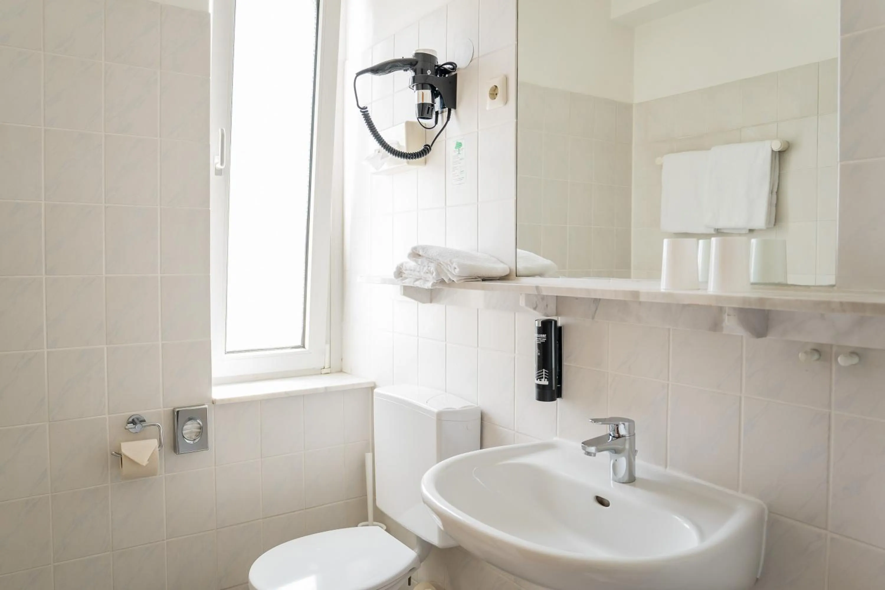 Toilet in Antares Apartments