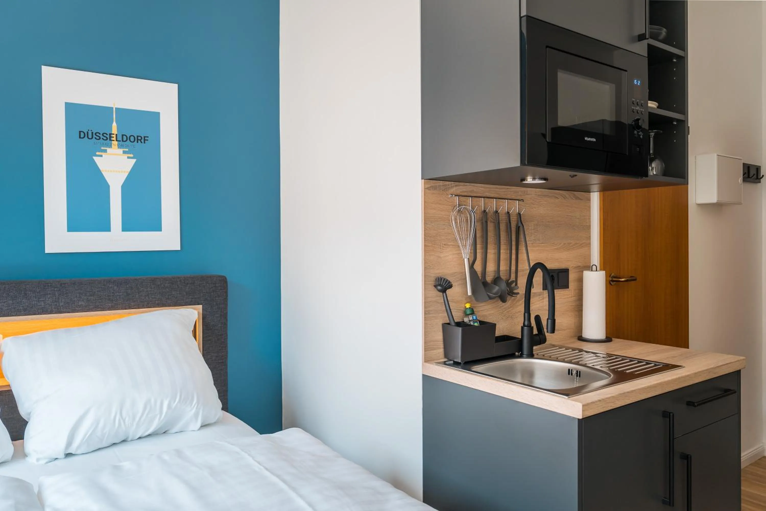 Kitchen or kitchenette, Bed in Antares Apartments