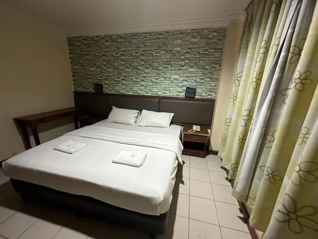 Bed in Lady Anne Hotel Sandkan