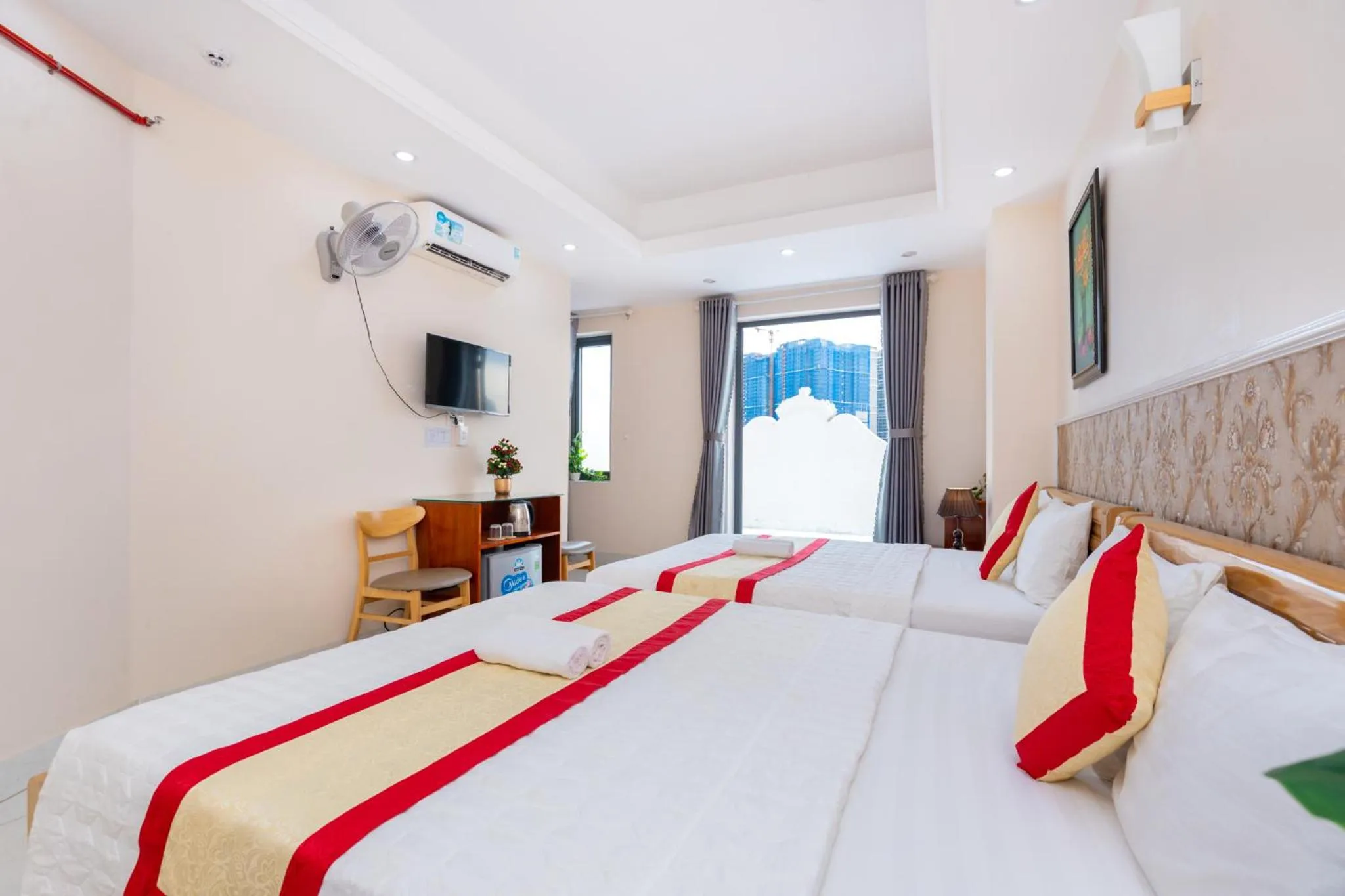 Communal lounge/ TV room, Bed in Biển Vàng Vũng Tàu Hotel