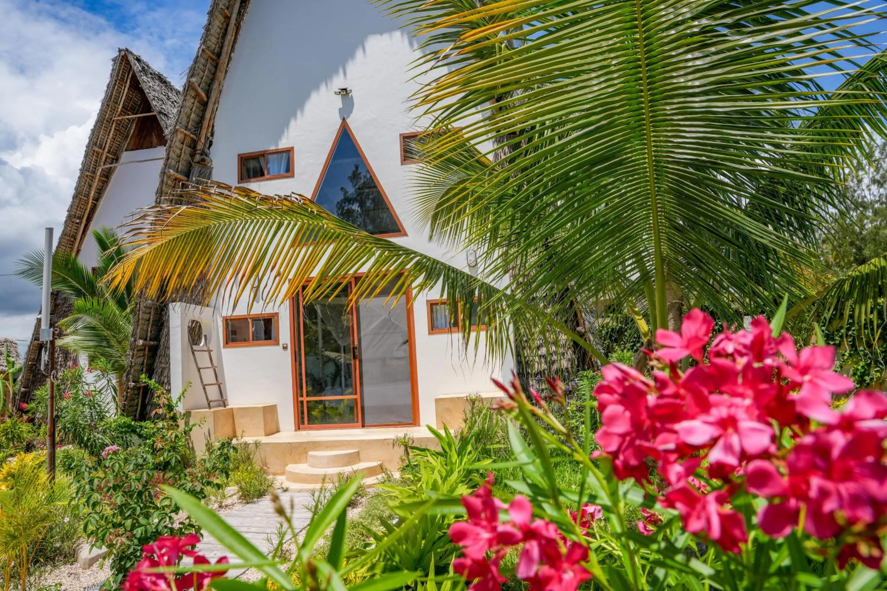 Photo of the whole room in La Perla Beach Resort, Zanzibar - Your Beachfront Private Haven
