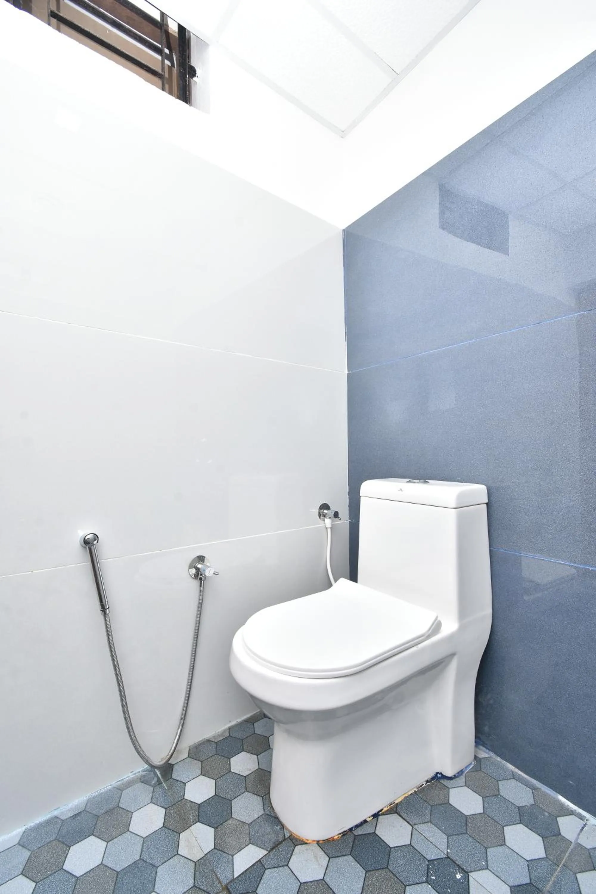 Toilet in HOTEL KANNUR CAPITAL CALTEX