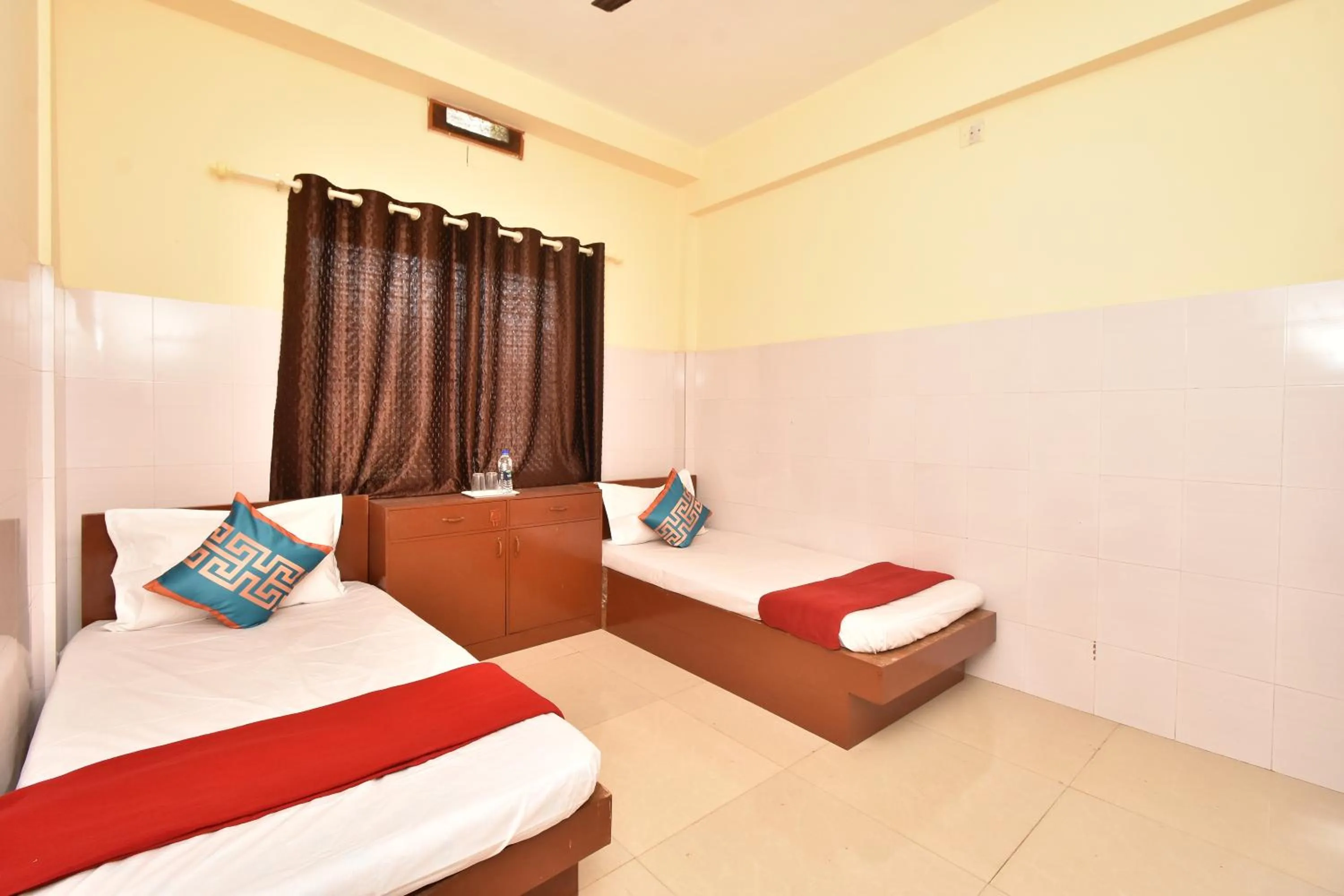 Photo of the whole room, Bed in HOTEL KANNUR CAPITAL CALTEX