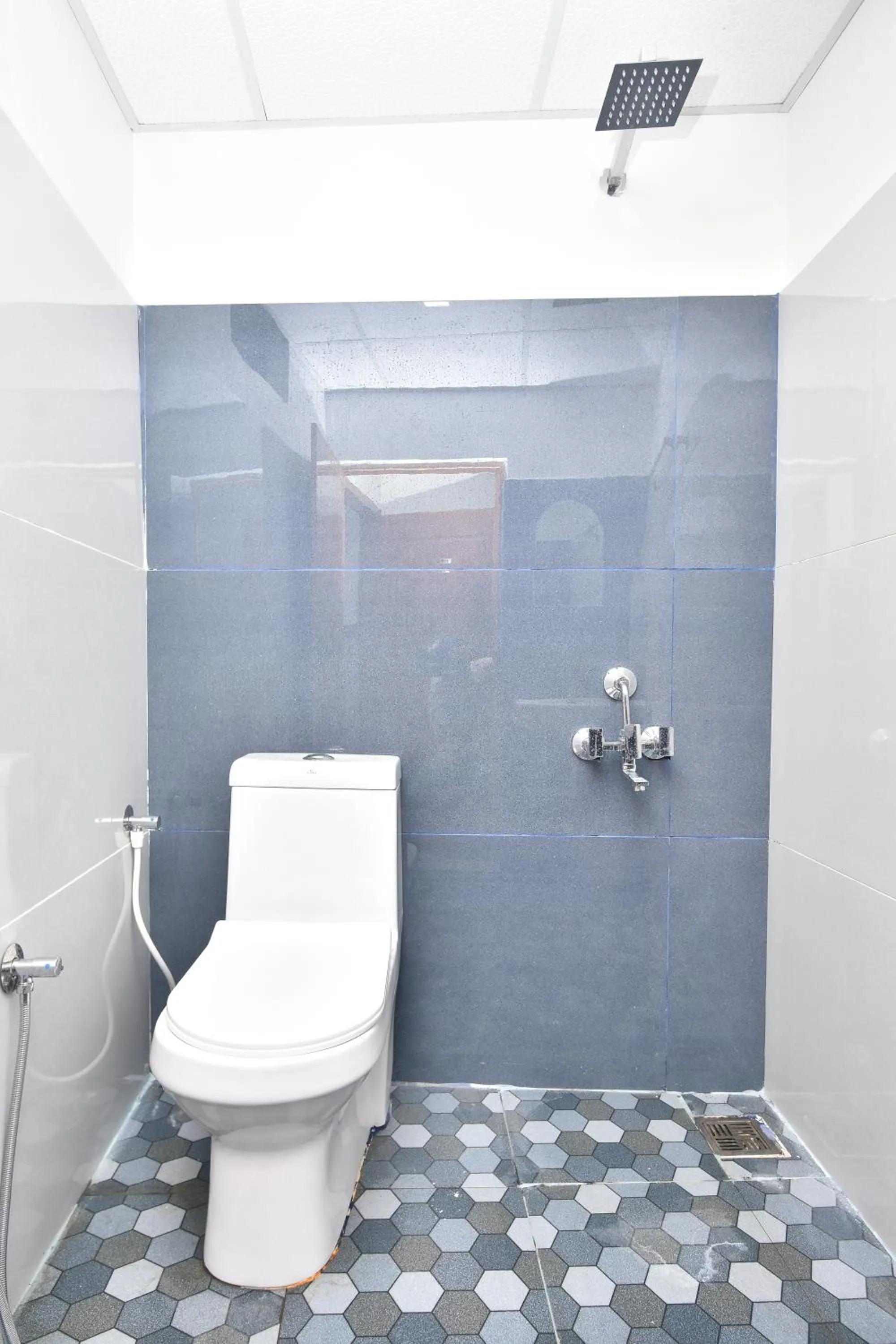 Toilet in HOTEL KANNUR CAPITAL CALTEX