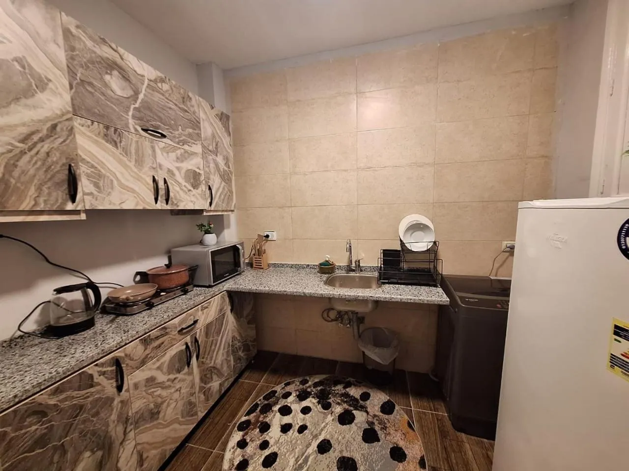 Kitchen or kitchenette in downtown Family Suites