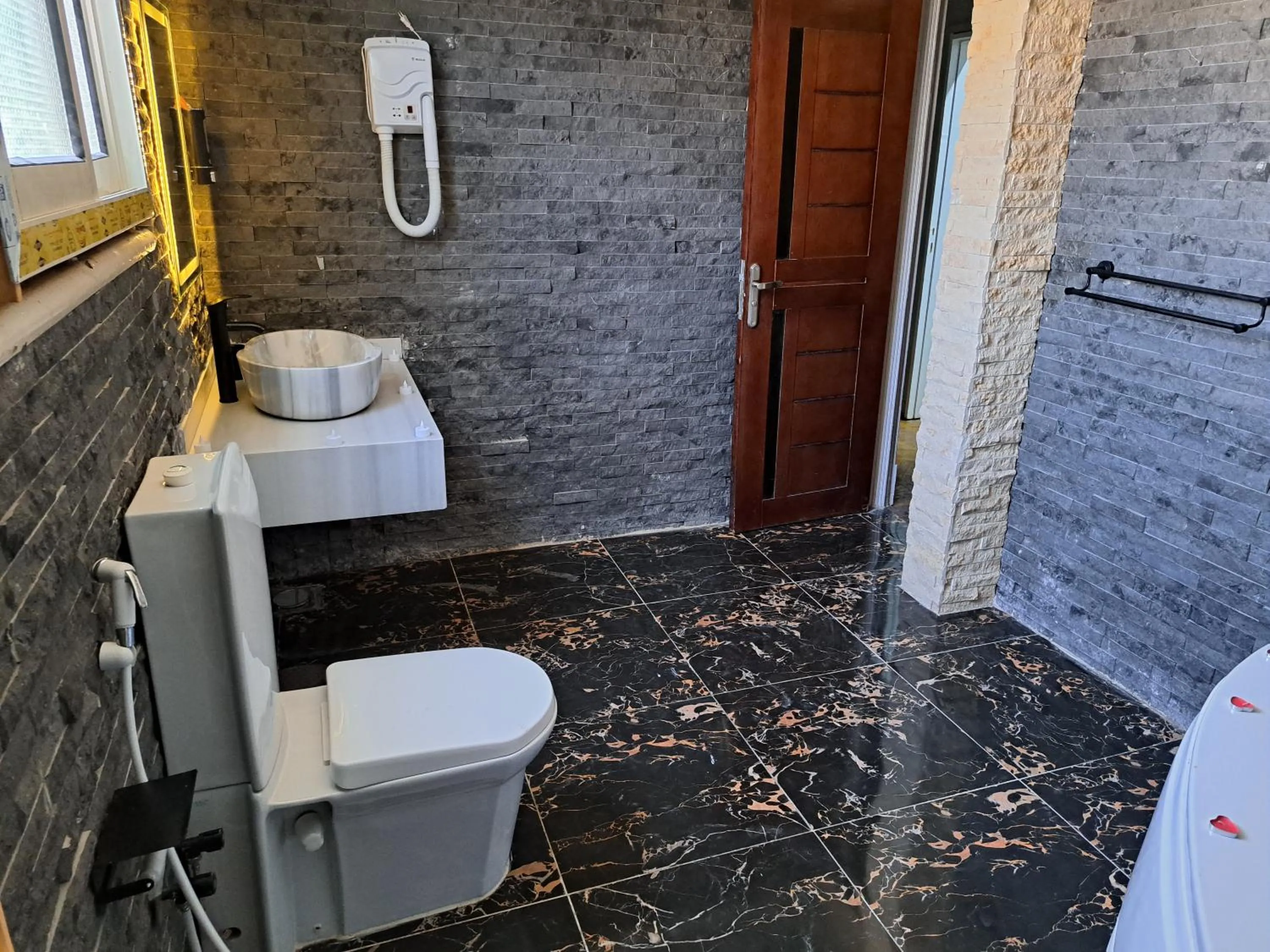 Bathroom in downtown Family Suites