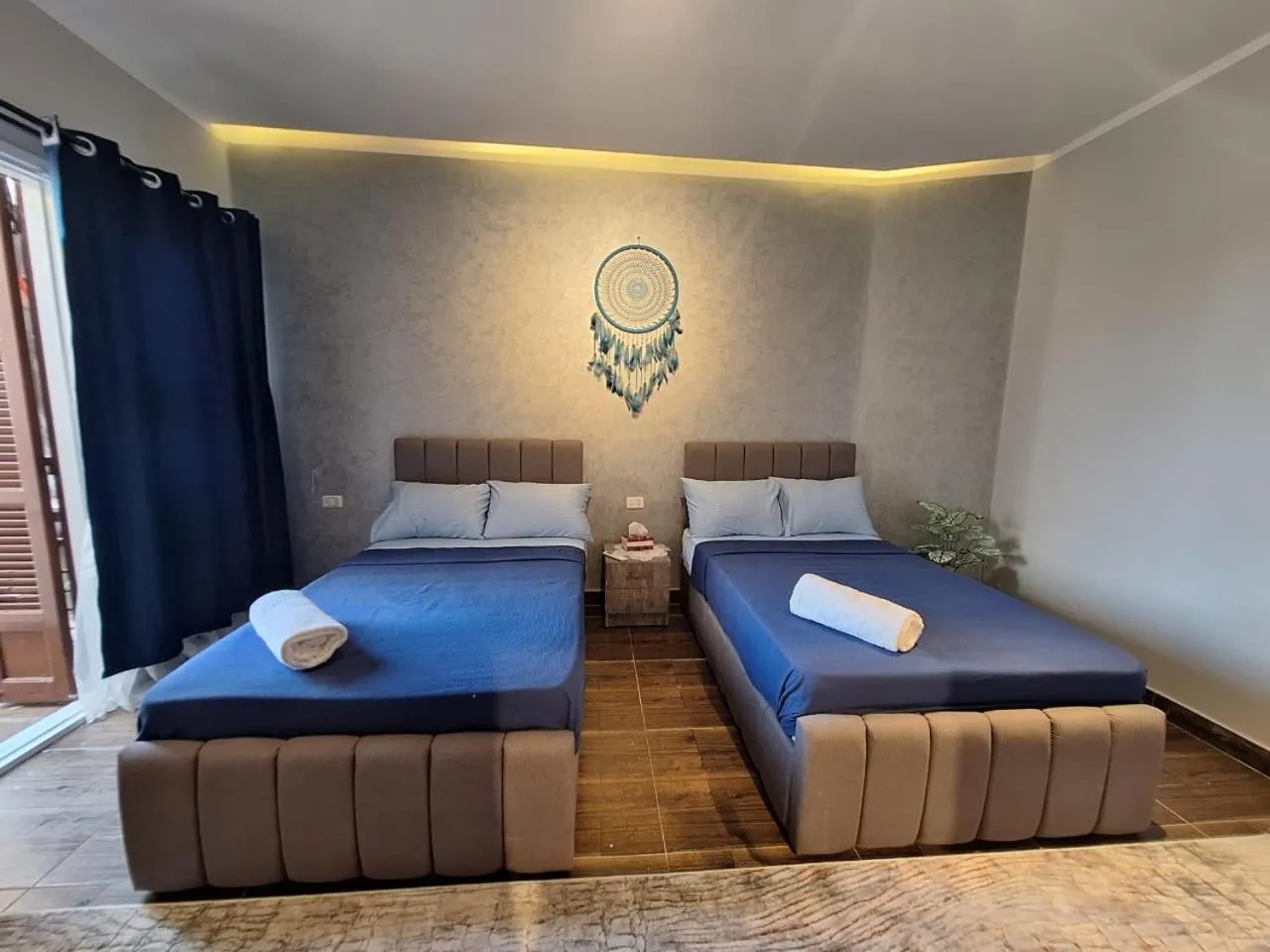 Bedroom, Bed in downtown Family Suites